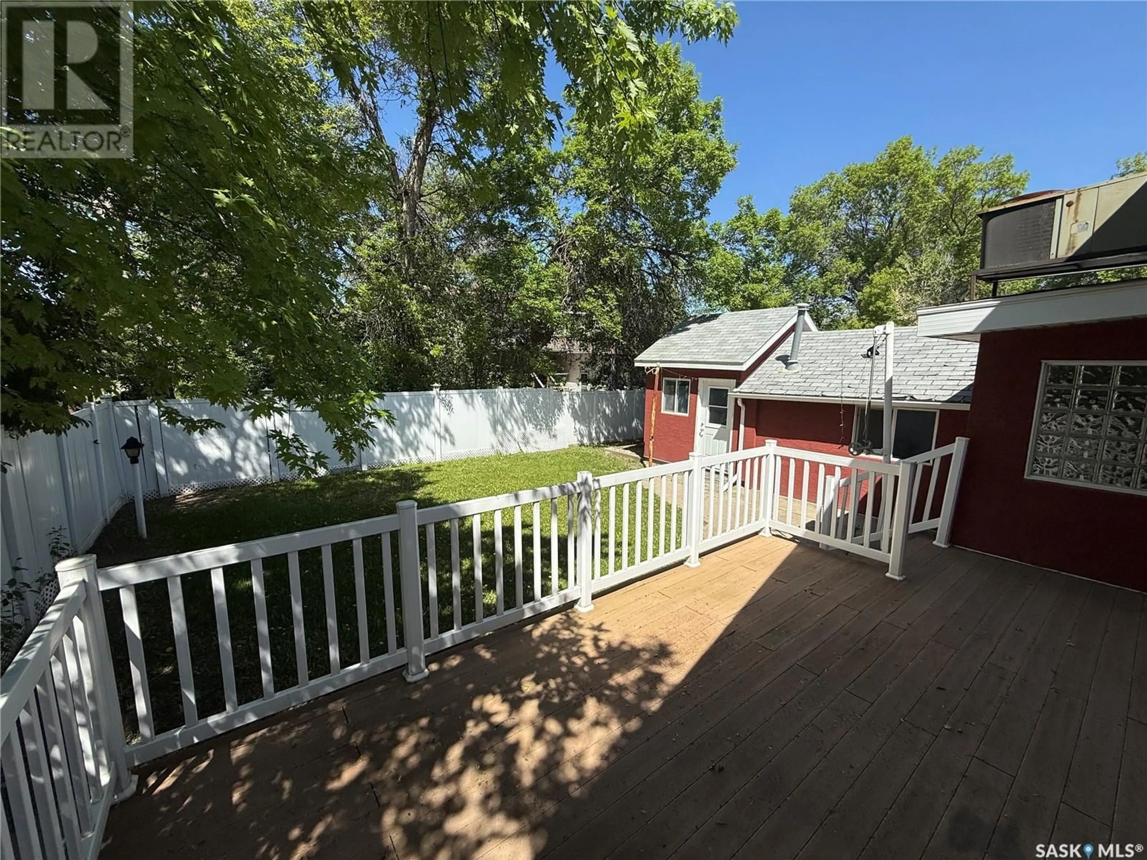 A pic from outside/outdoor area/front of a property/back of a property/a pic from drone, unknown for 319 7TH STREET, Weyburn Saskatchewan S4H1C5
