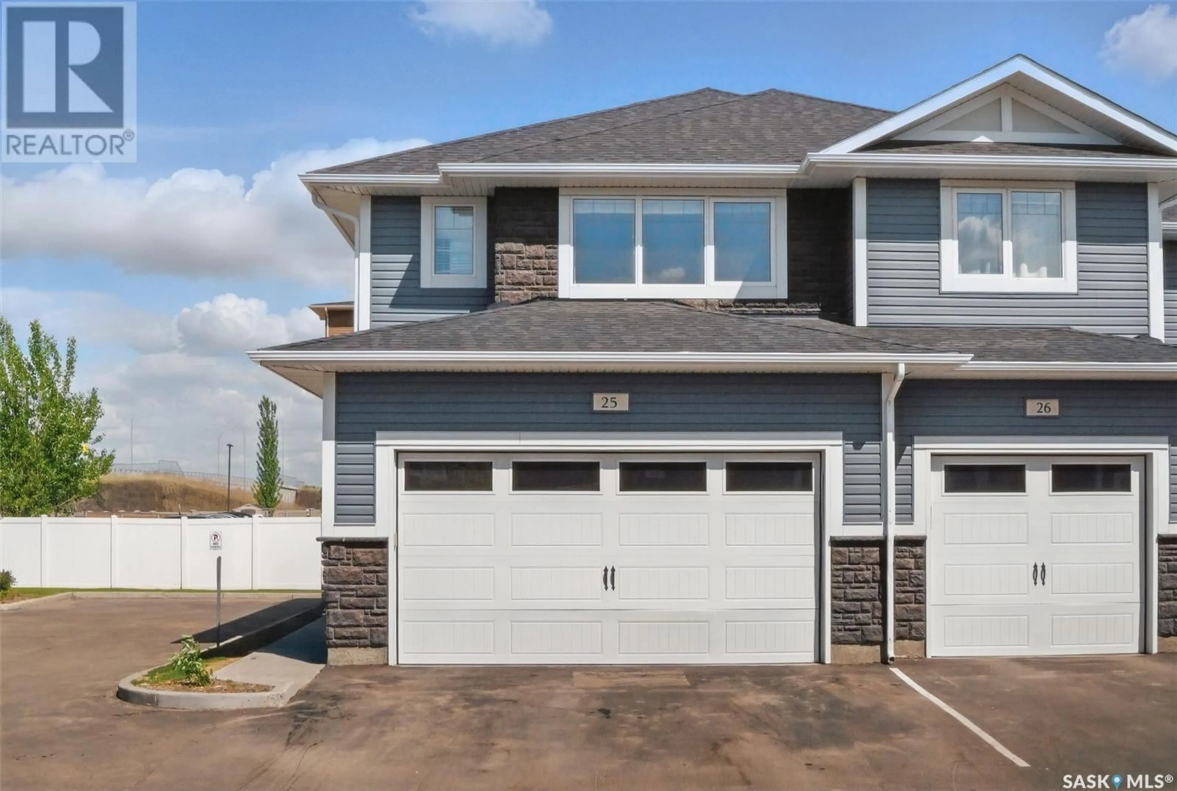 Home with vinyl exterior material, street for 25 115 VELTKAMP CRESCENT, Saskatoon Saskatchewan S7T0T7