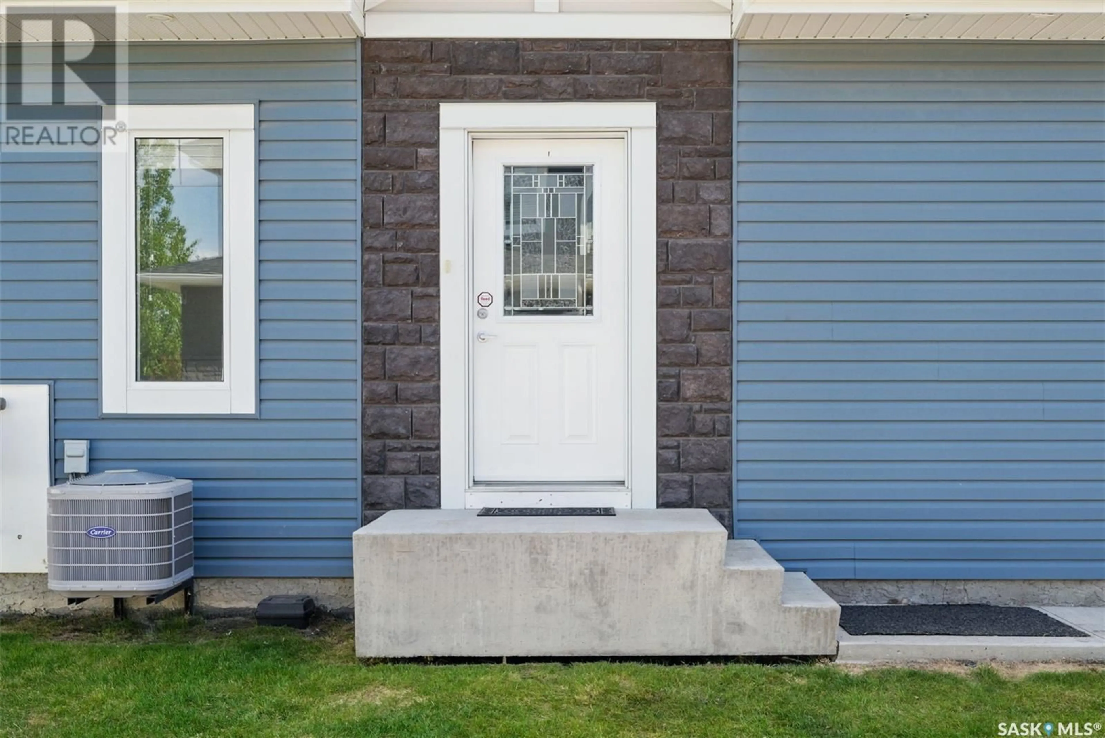 Home with vinyl exterior material, street for 25 115 VELTKAMP CRESCENT, Saskatoon Saskatchewan S7T0T7