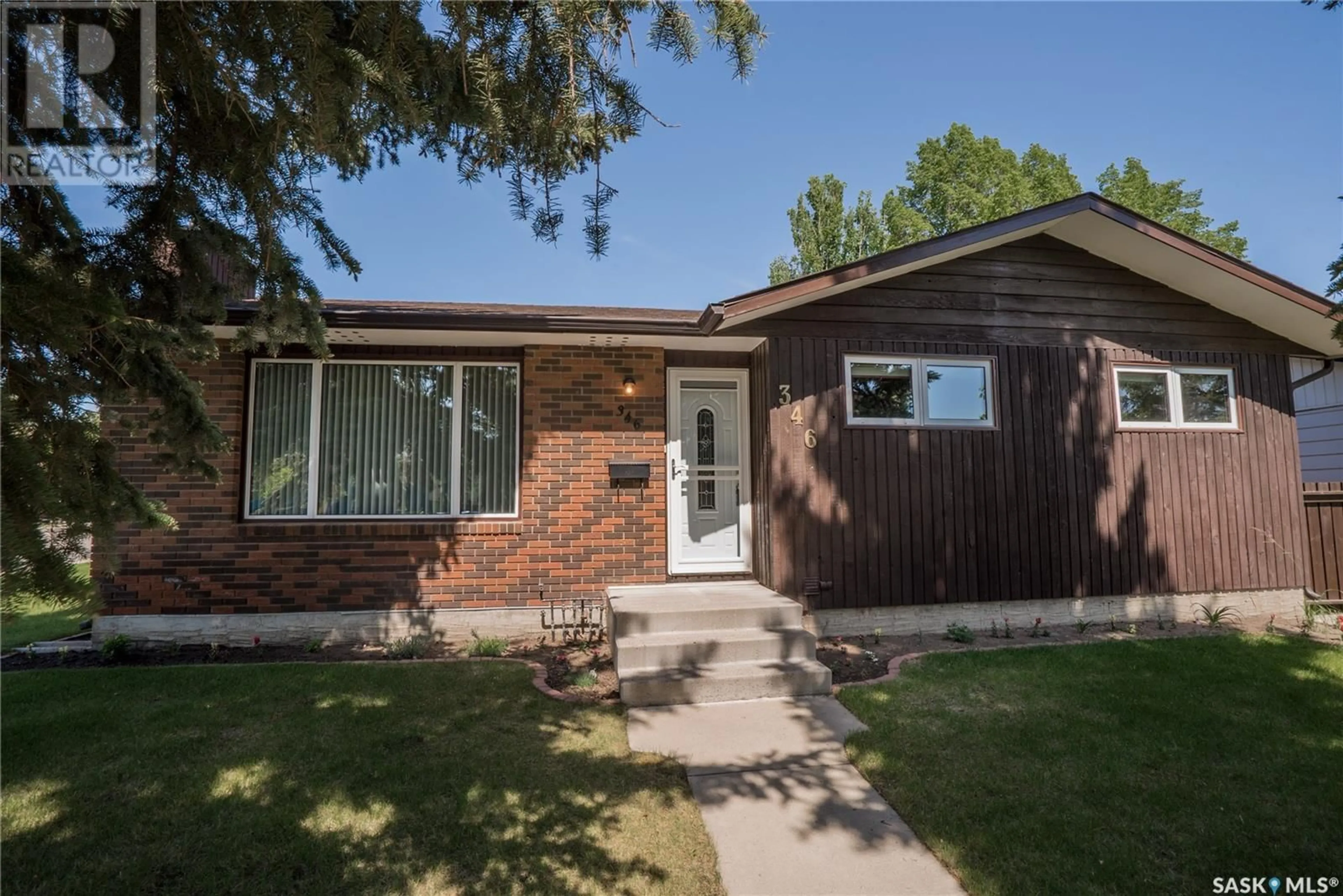 Home with brick exterior material, street for 346 FORRESTER ROAD, Saskatoon Saskatchewan S7M4G5