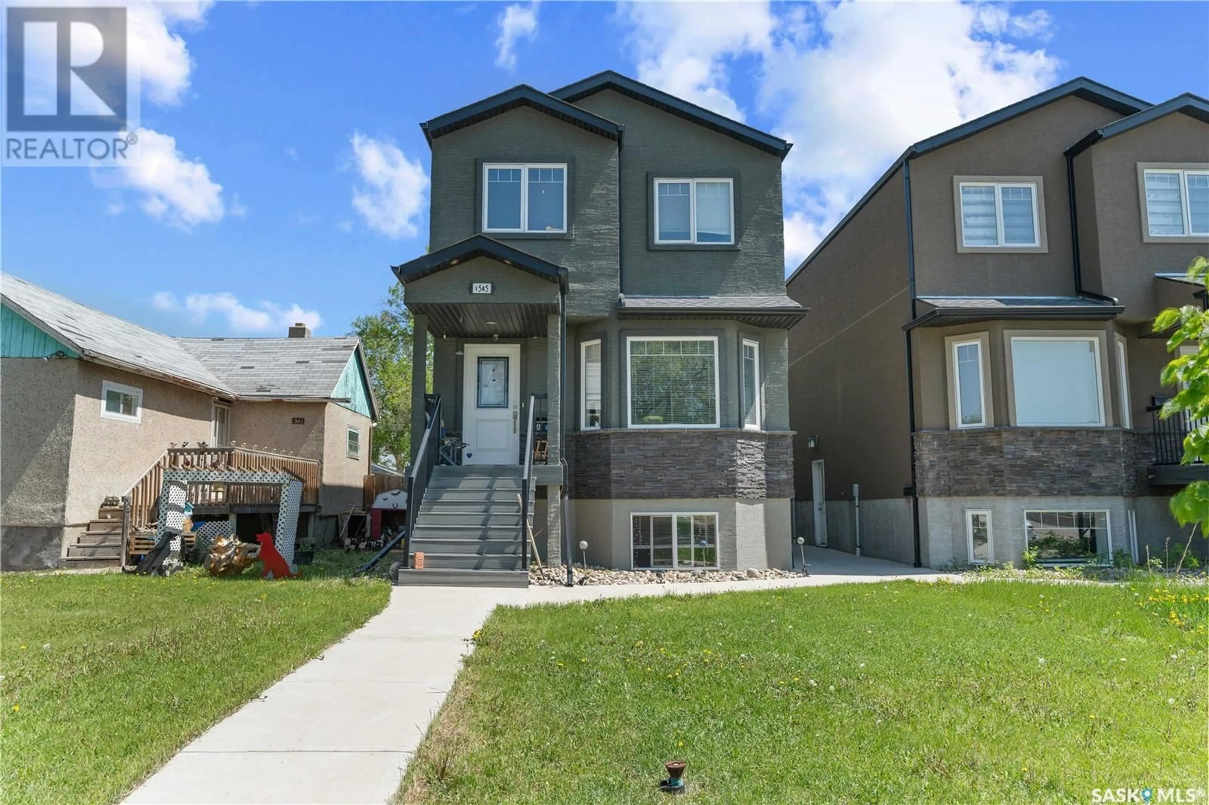Home with vinyl exterior material, street for 1545 LACON STREET, Regina Saskatchewan S4N1Z3