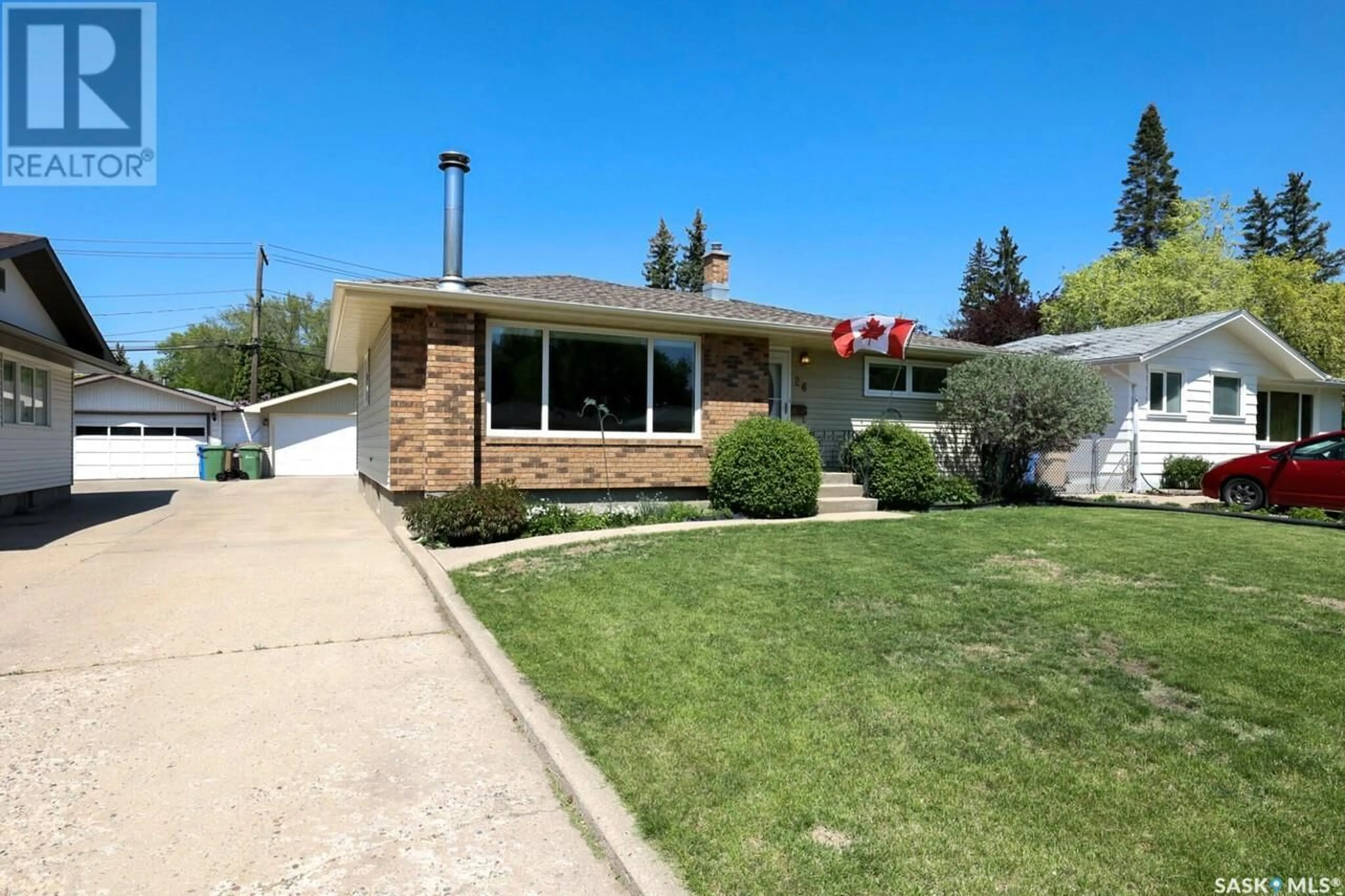 Home with vinyl exterior material, street for 26 MILLAR CRESCENT, Regina Saskatchewan S4S1N2