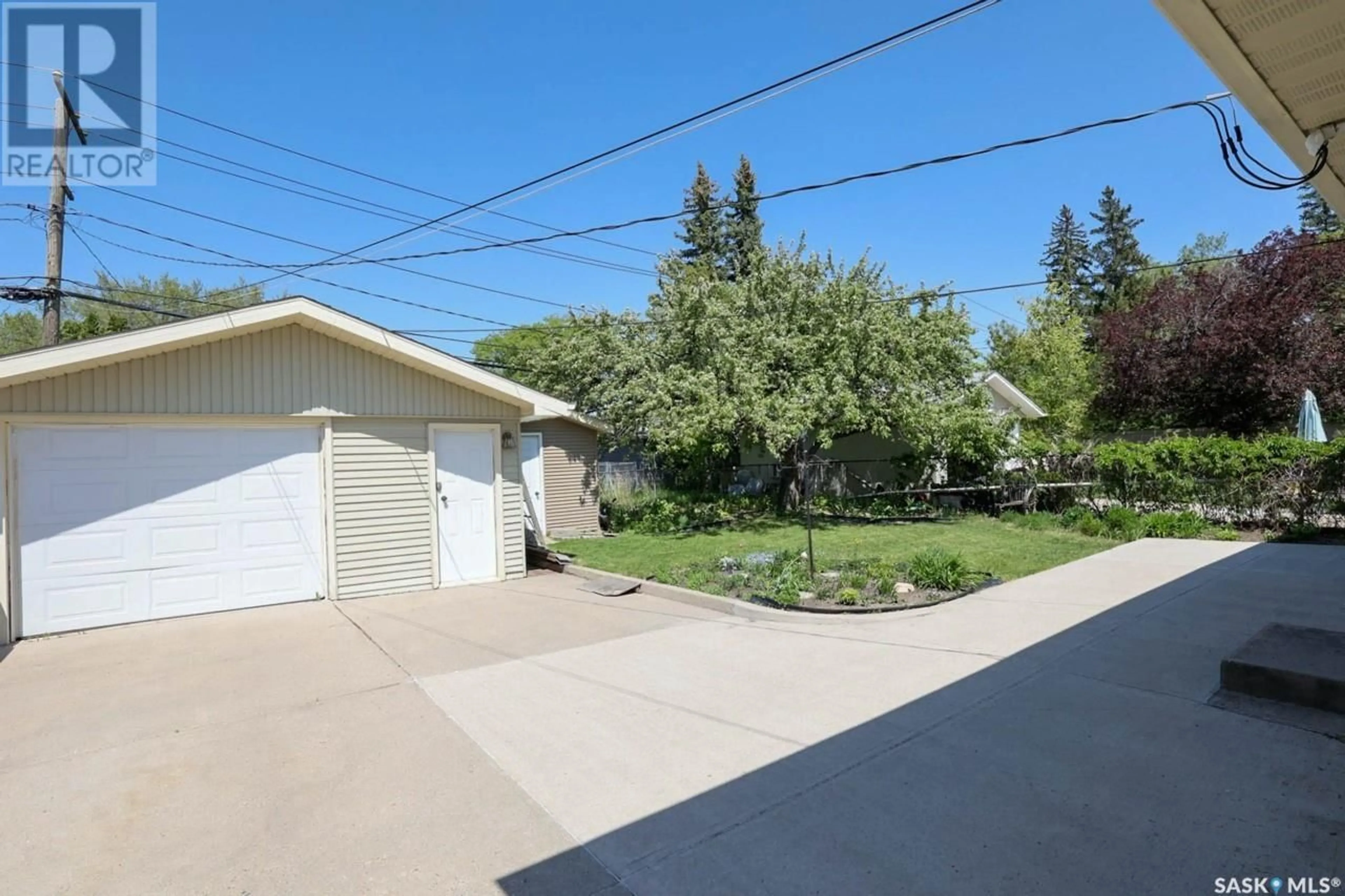 A pic from outside/outdoor area/front of a property/back of a property/a pic from drone, street for 26 MILLAR CRESCENT, Regina Saskatchewan S4S1N2