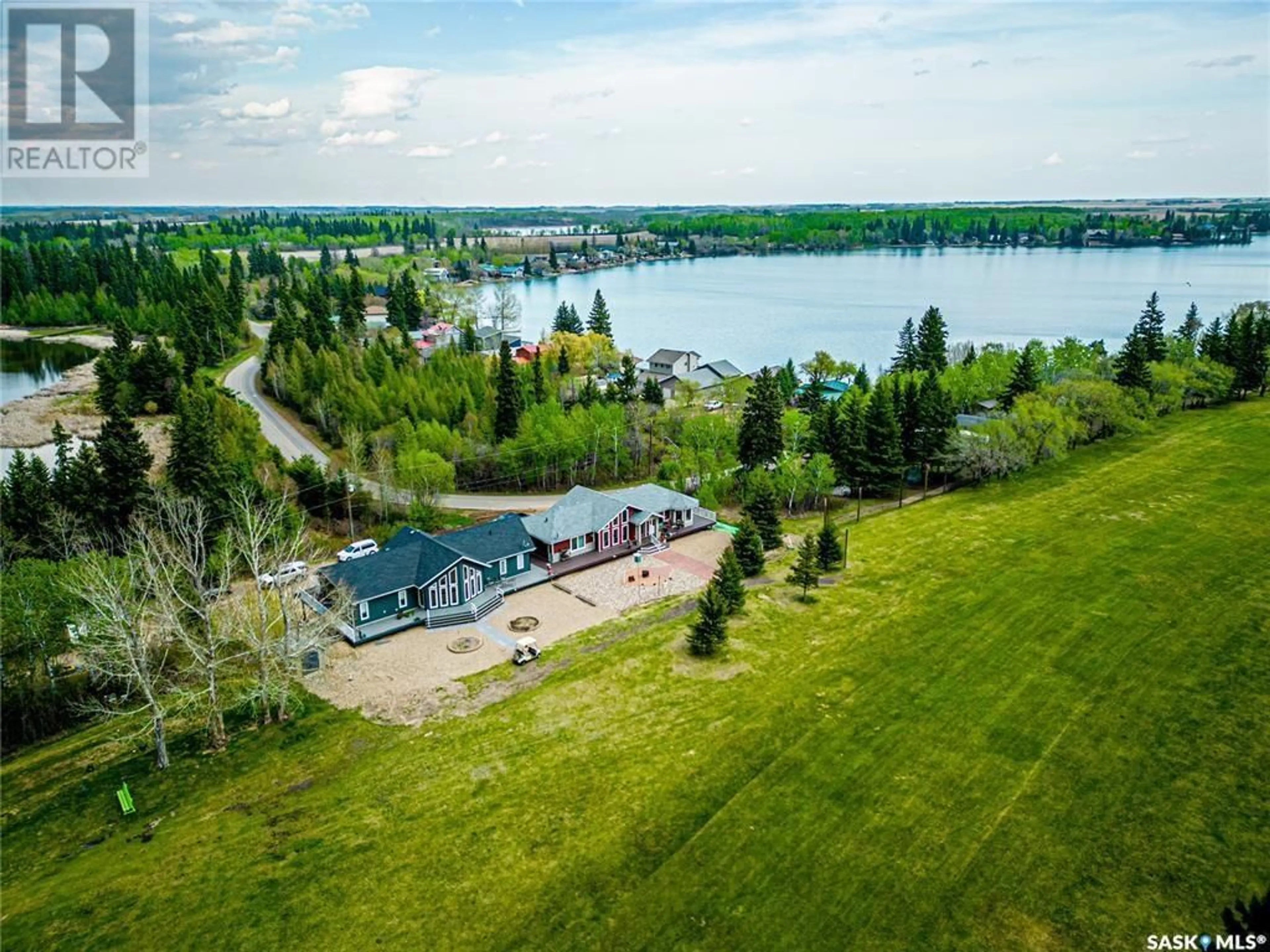 A pic from outside/outdoor area/front of a property/back of a property/a pic from drone, water/lake/river/ocean view for 201 LAKEVIEW DRIVE, Keys Rm No. 303 Saskatchewan S0A0L0