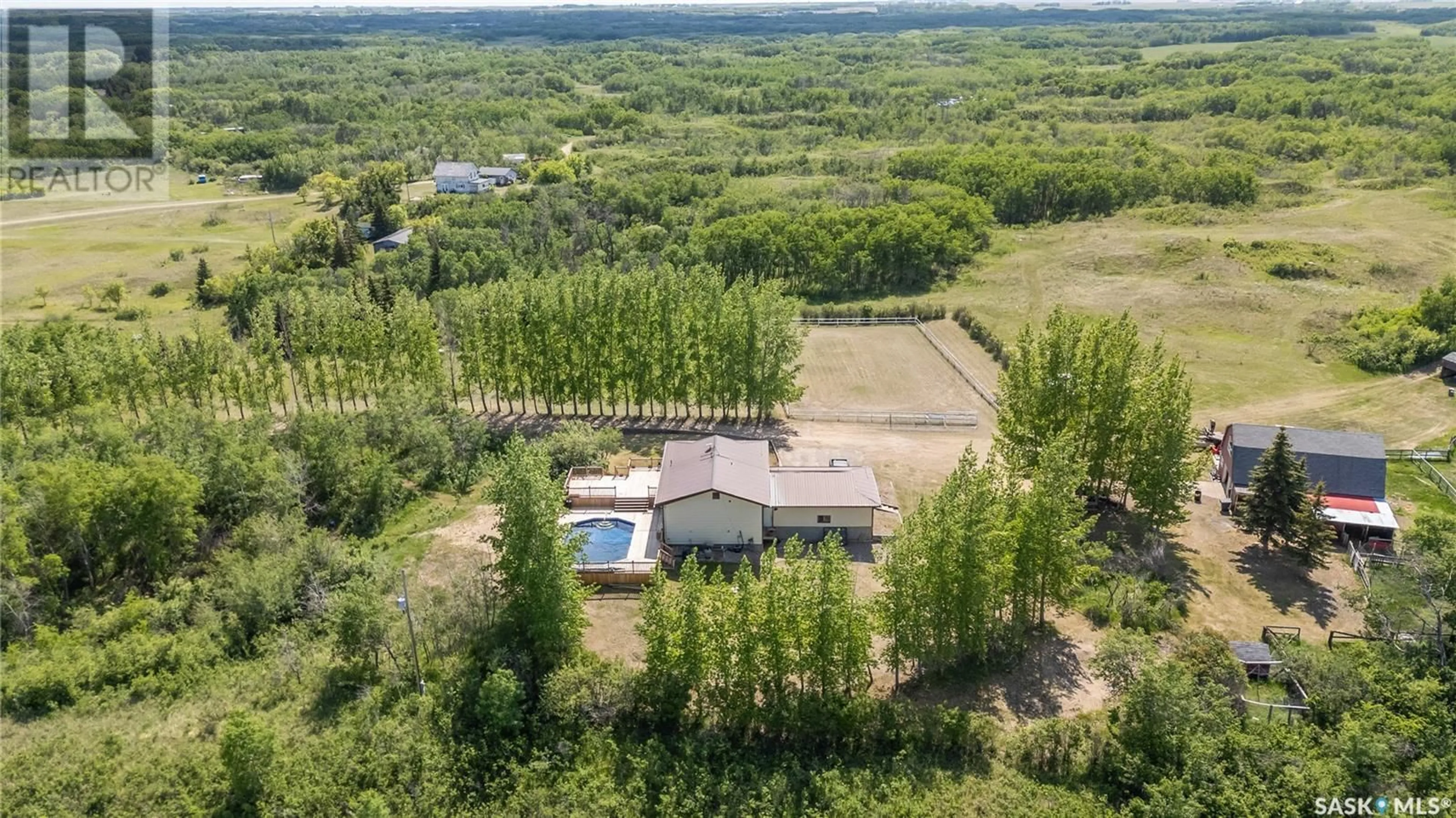 A pic from outside/outdoor area/front of a property/back of a property/a pic from drone, unknown for 3070 - 35322 RANGE ROAD, Vanscoy Rm No. 345 Saskatchewan S7K3J6