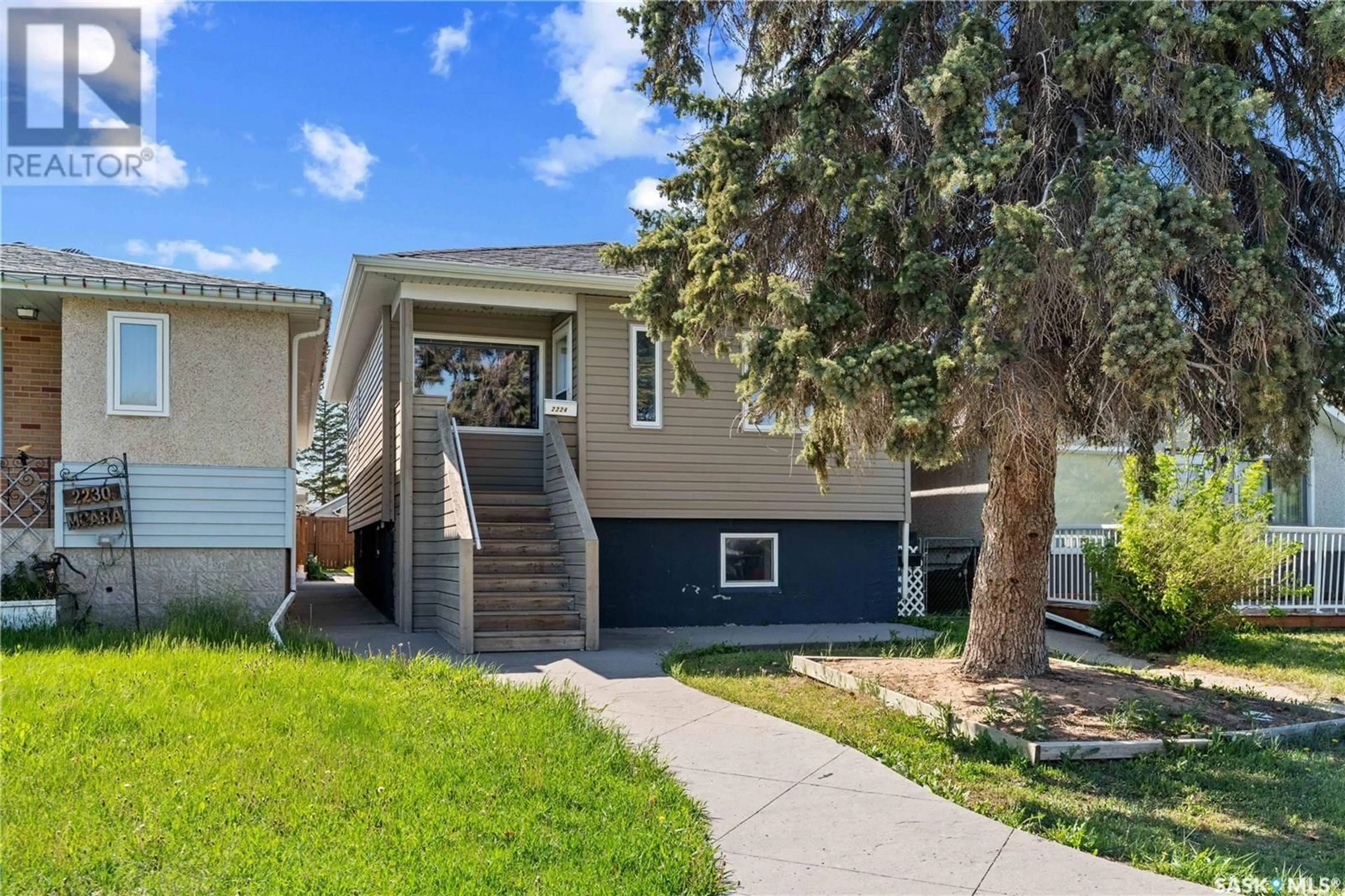 Home with vinyl exterior material, street for 2224 MCARA STREET, Regina Saskatchewan S4N2W1