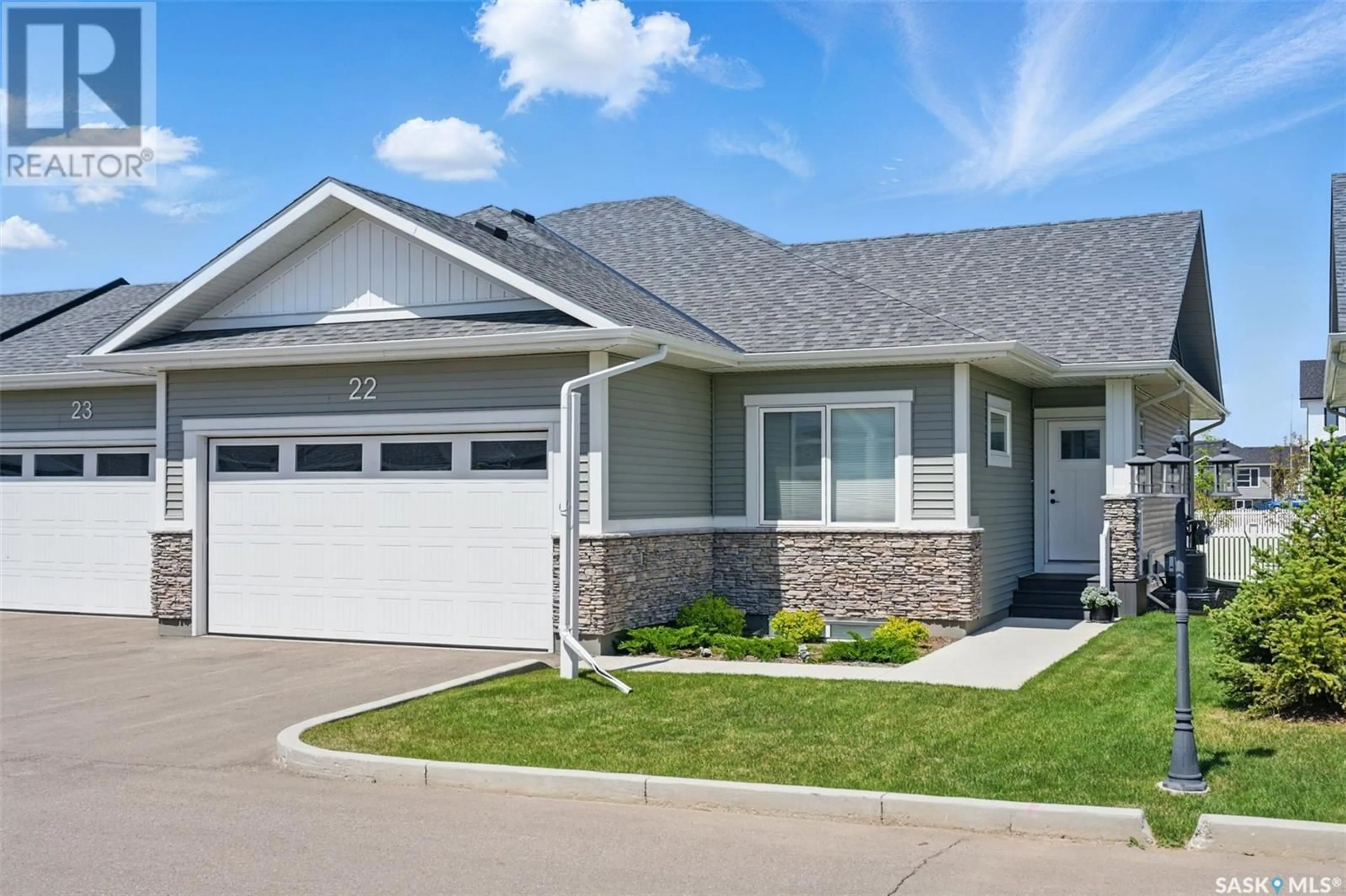 Home with vinyl exterior material, street for 22 437 PALMER CRESCENT, Warman Saskatchewan S0K4S1