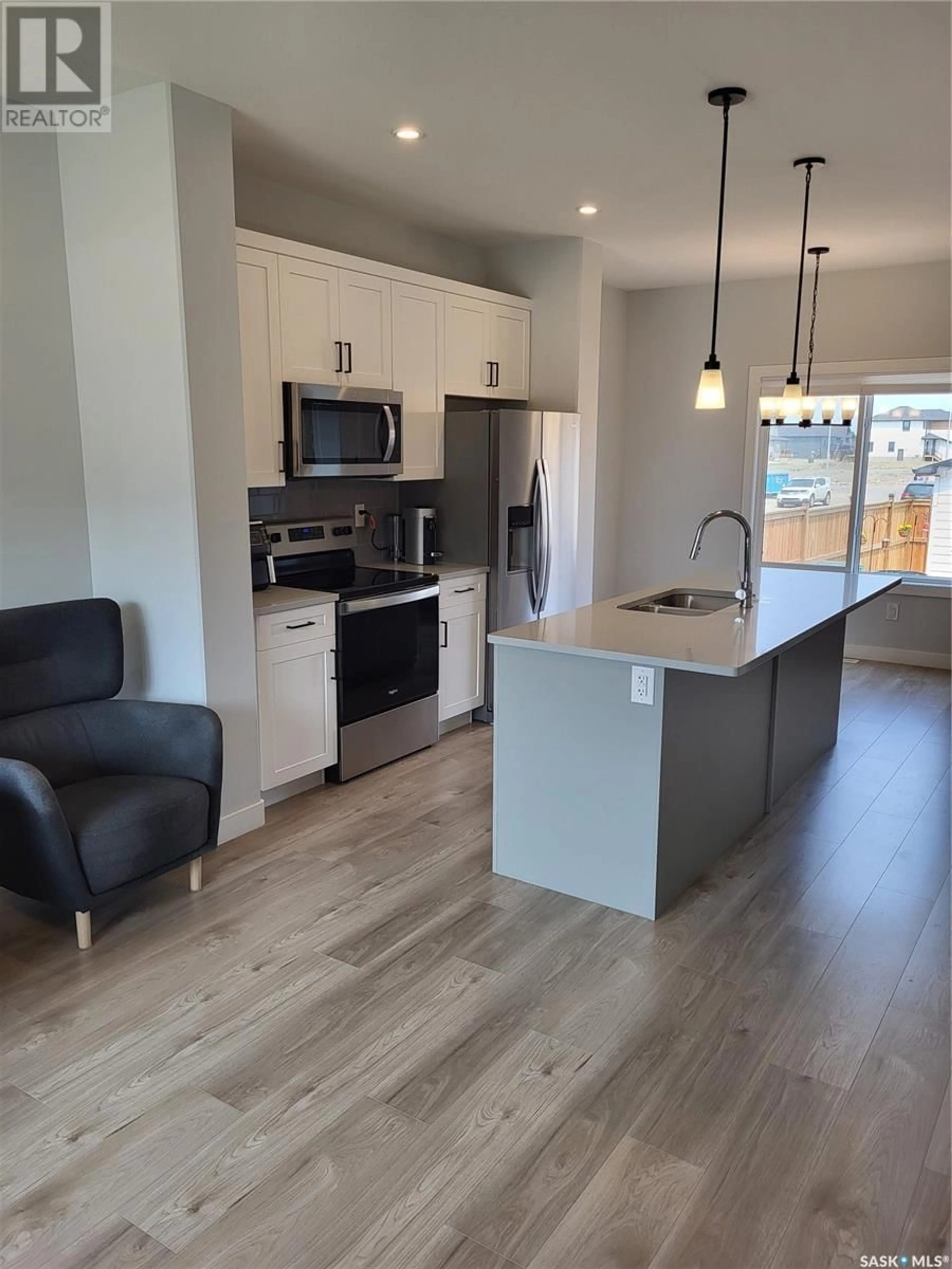 Open concept kitchen, unknown for 127 KOSTIUK CRESCENT, Saskatoon Saskatchewan S7V1R8