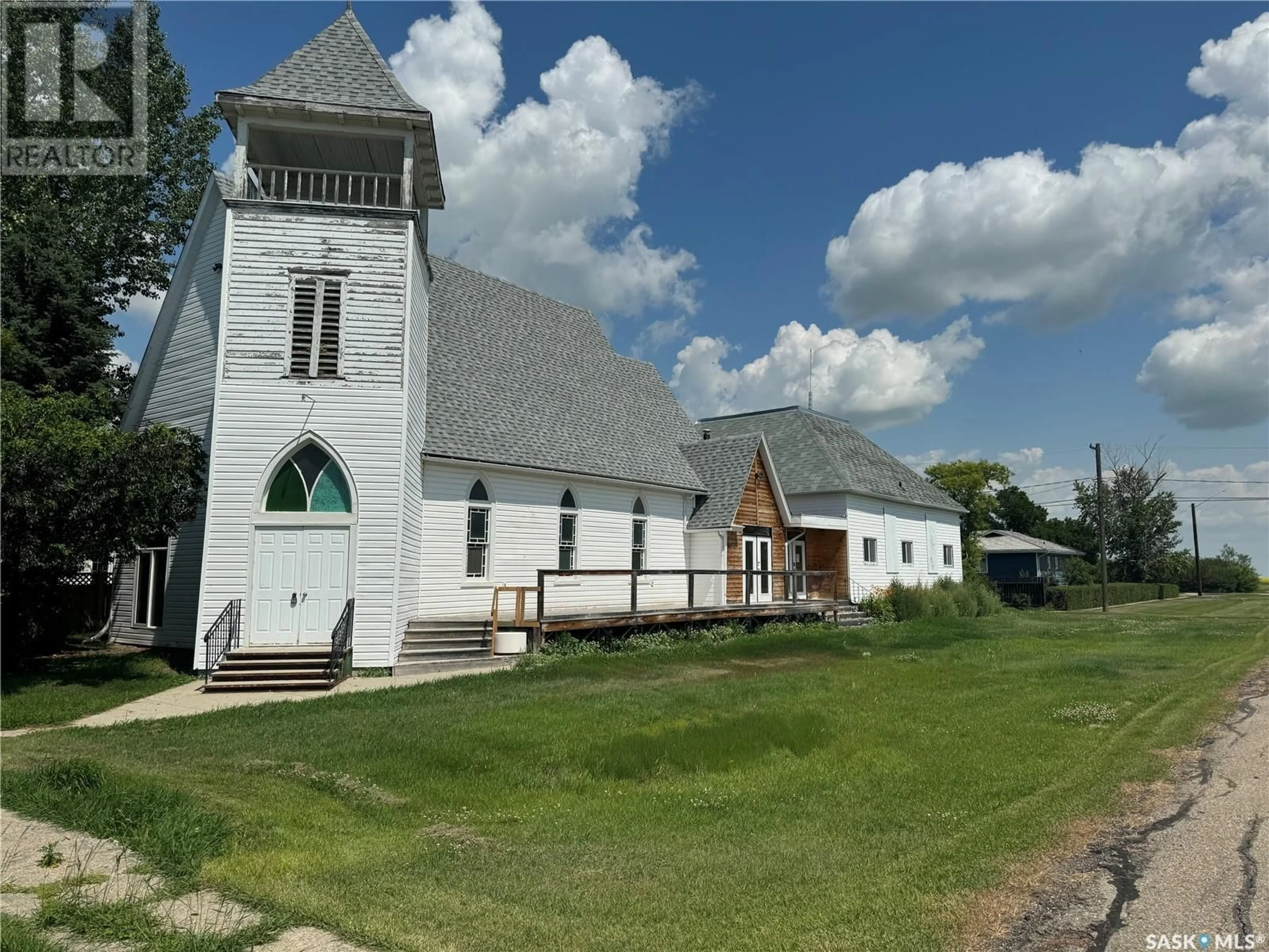 A pic from outside/outdoor area/front of a property/back of a property/a pic from drone, building for 400 1ST STREET, Lang Saskatchewan S0G2W0
