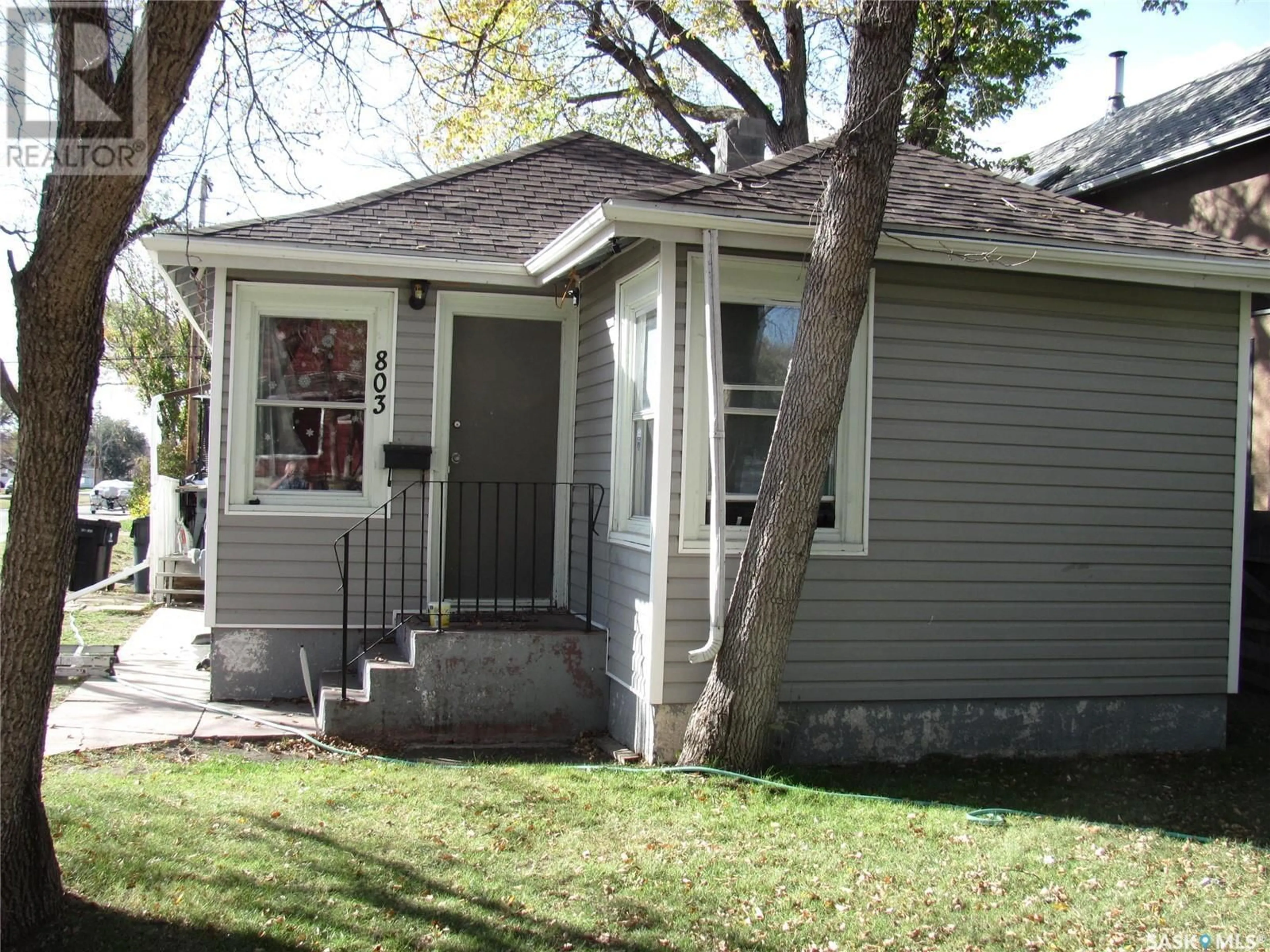 Home with vinyl exterior material, street for 803 I AVENUE, Saskatoon Saskatchewan S7L2H2