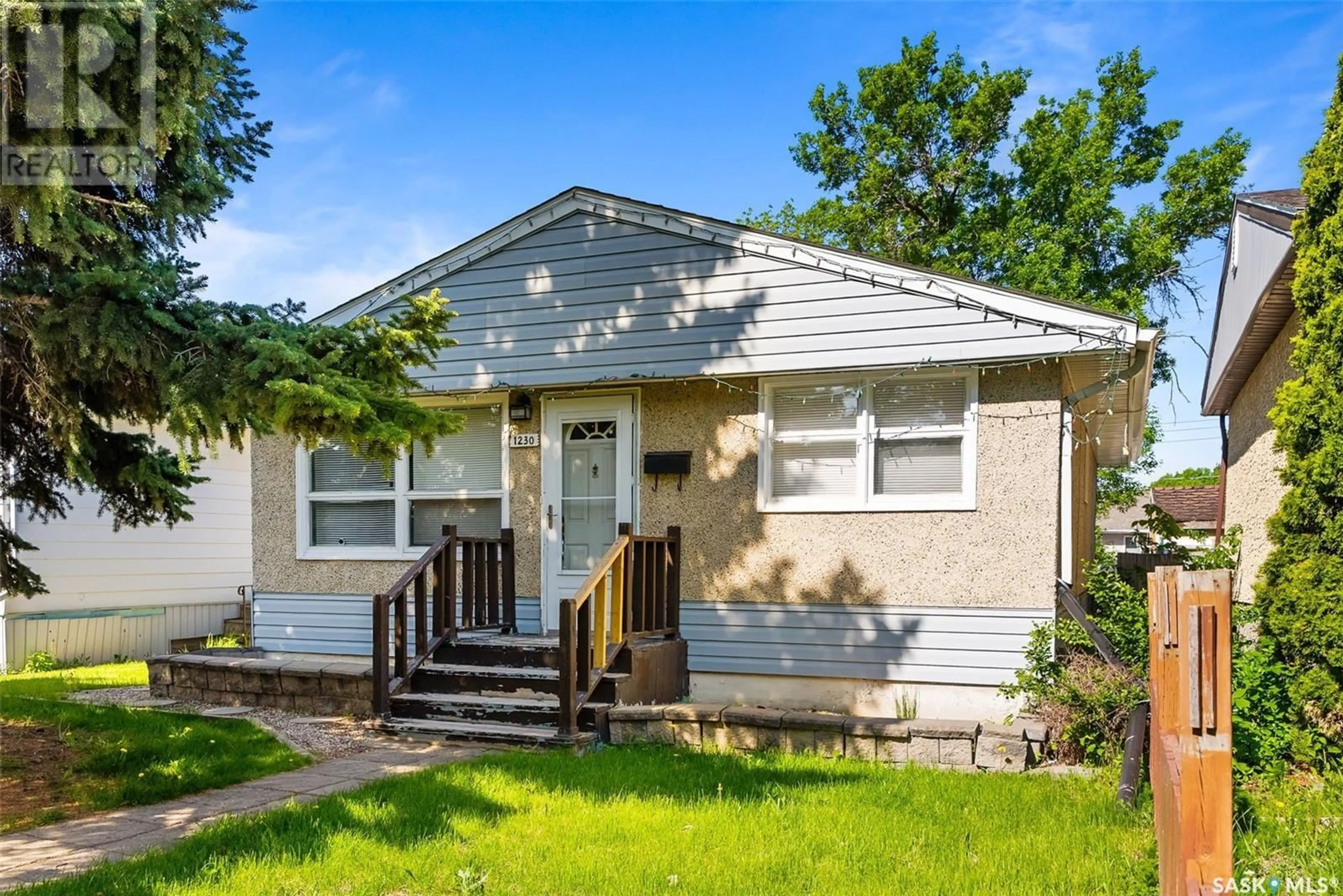 Home with vinyl exterior material, street for 1230 CAMPBELL STREET, Regina Saskatchewan S4T5P7
