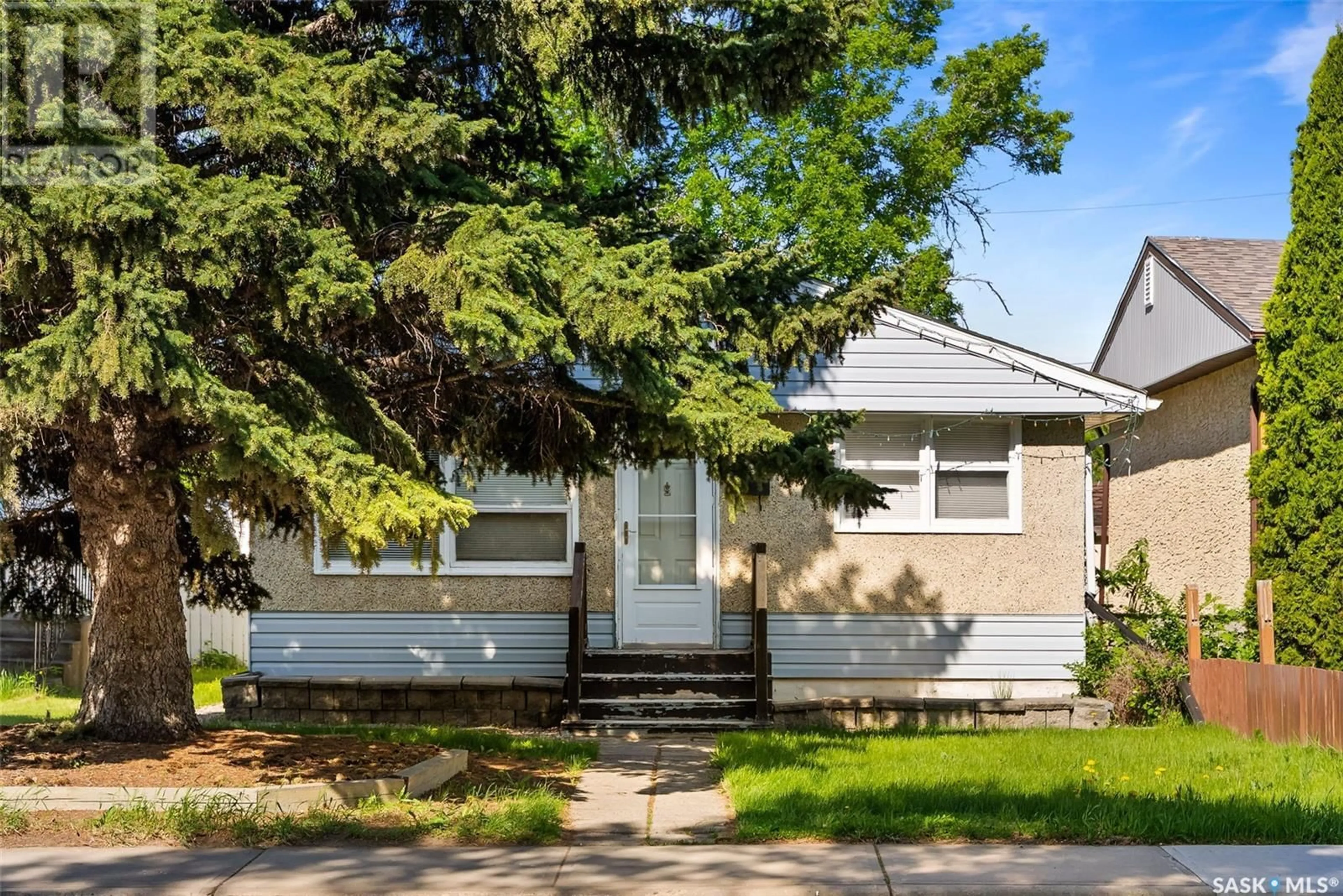 Home with vinyl exterior material, street for 1230 CAMPBELL STREET, Regina Saskatchewan S4T5P7