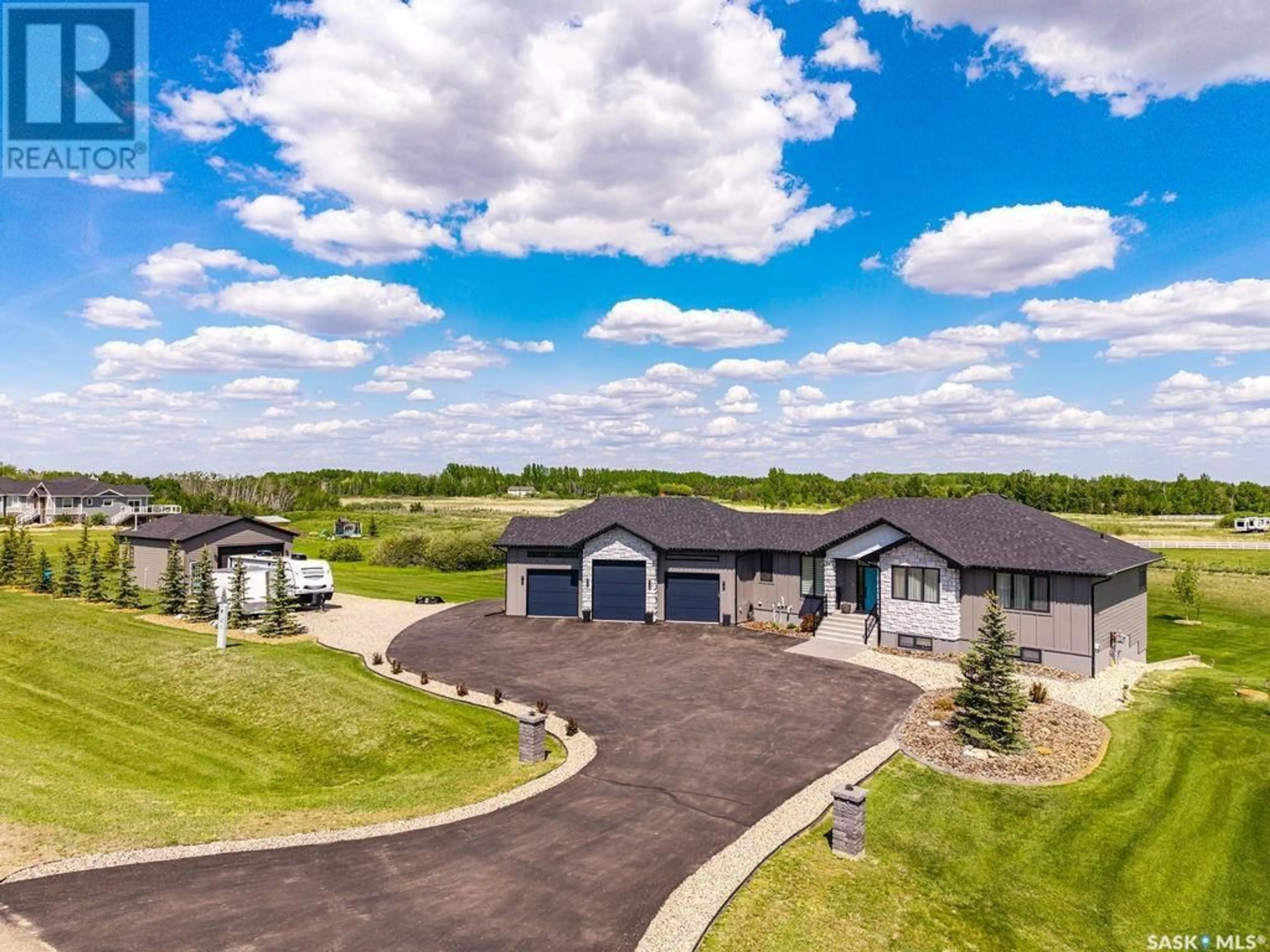 A pic from outside/outdoor area/front of a property/back of a property/a pic from drone, unknown for 155 GRANDVIEW TRAIL, Corman Park Rm No. 344 Saskatchewan S7T1C8