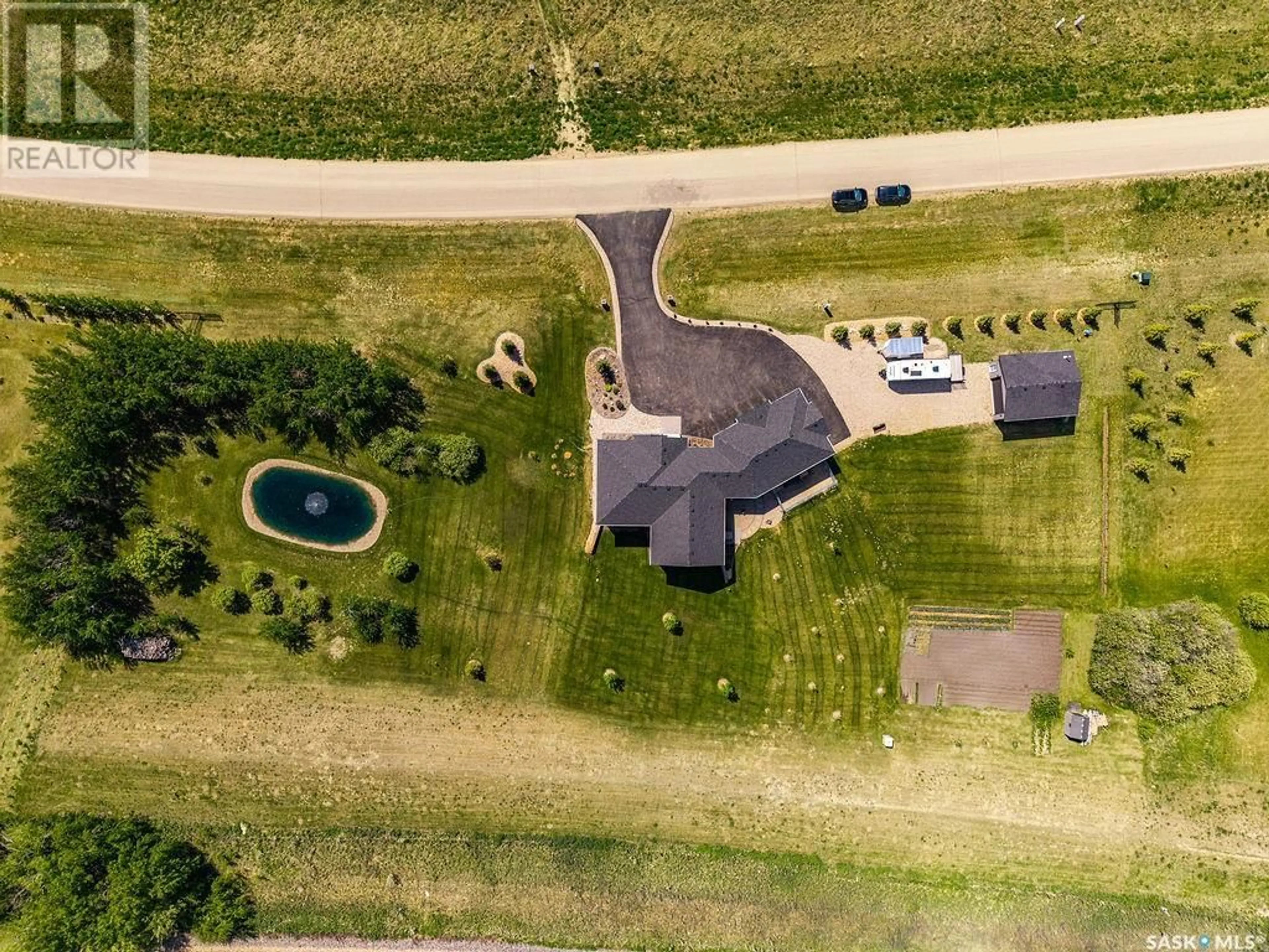 A pic from outside/outdoor area/front of a property/back of a property/a pic from drone, street for 155 GRANDVIEW TRAIL, Corman Park Rm No. 344 Saskatchewan S7T1C8
