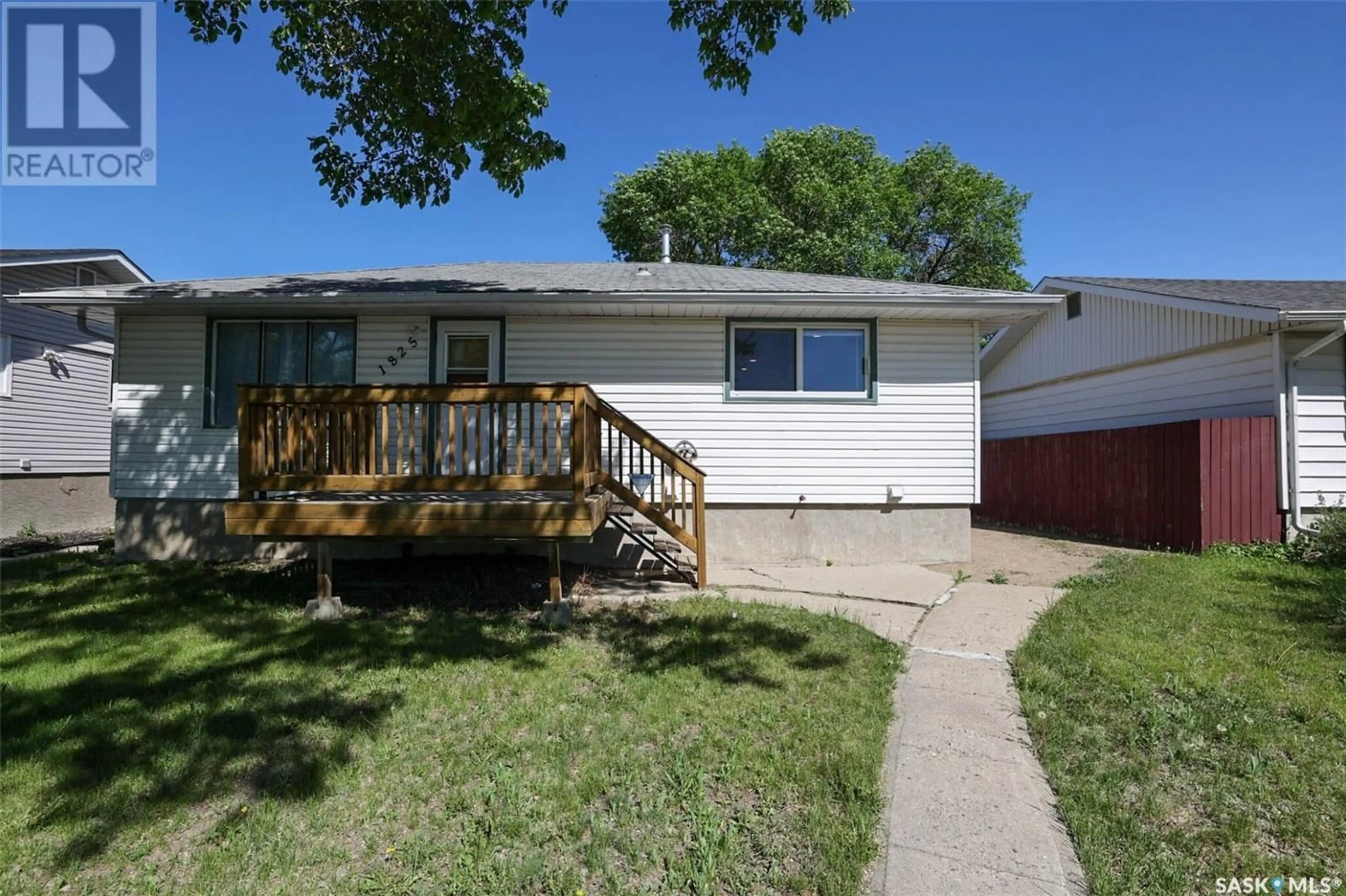 Home with vinyl exterior material, street for 1825 LACON STREET, Regina Saskatchewan S4N1Z9