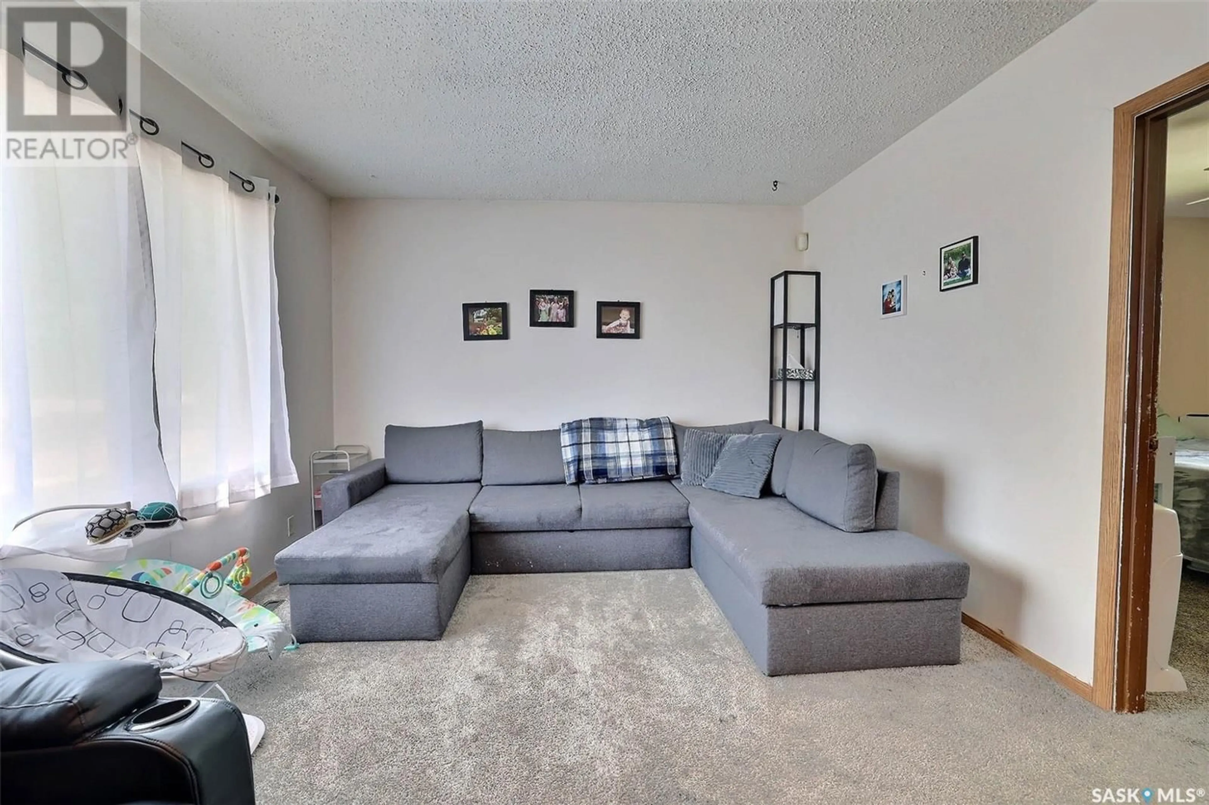 Living room with furniture, unknown for 1825 LACON STREET, Regina Saskatchewan S4N1Z9