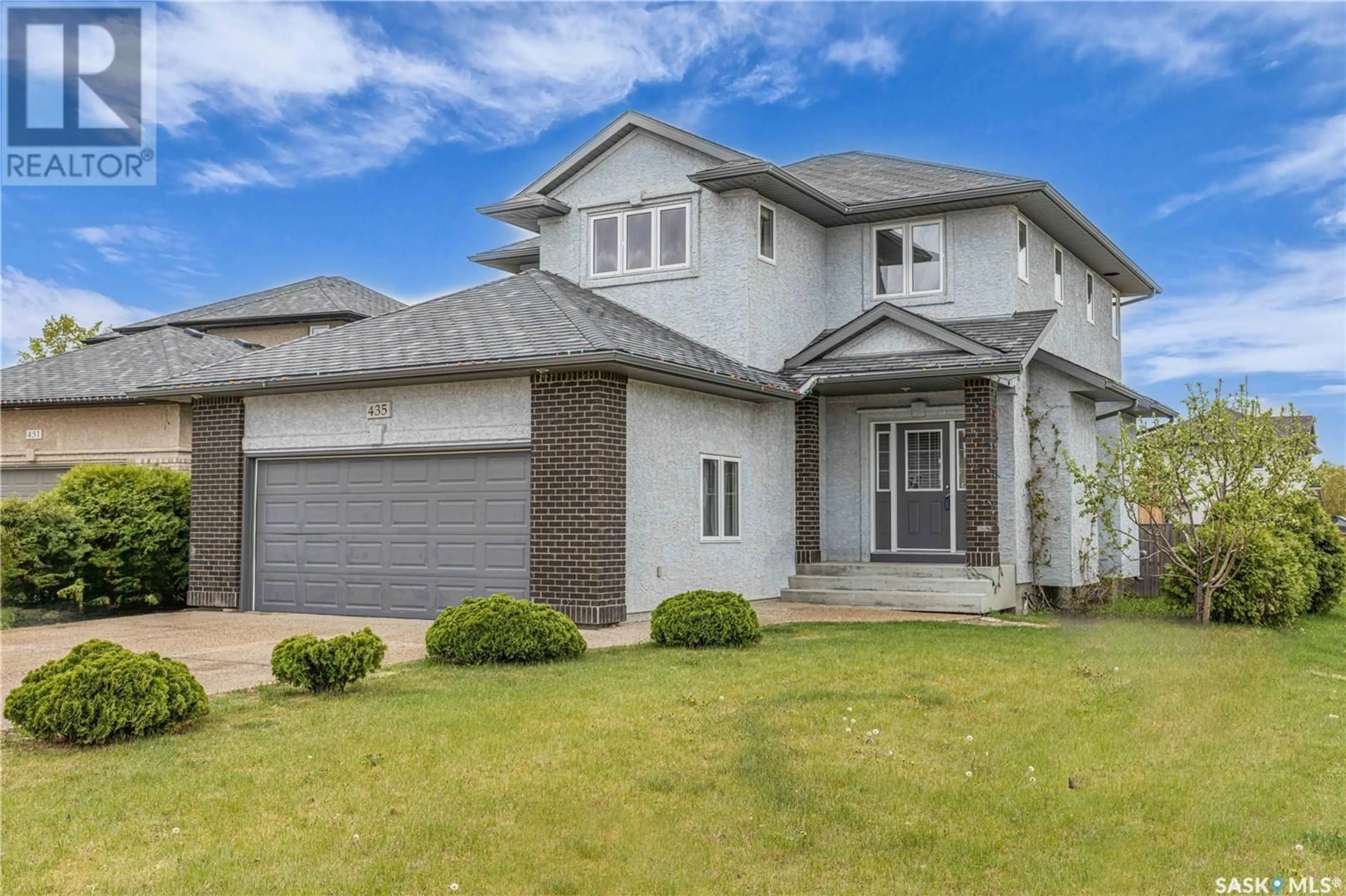 Home with brick exterior material, street for 435 MCINTOSH COURT, Saskatoon Saskatchewan S7T0C4