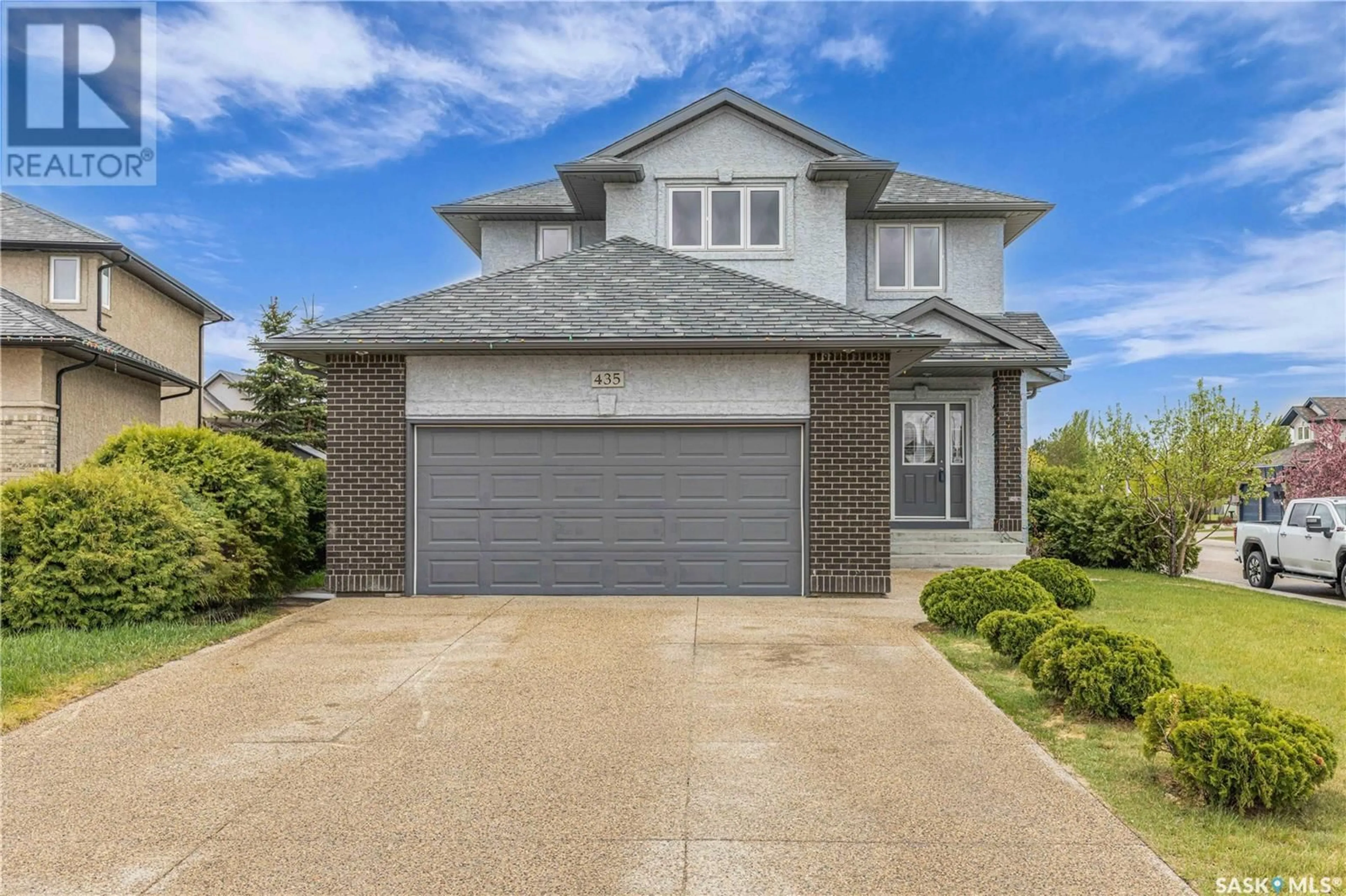 Home with brick exterior material, street for 435 MCINTOSH COURT, Saskatoon Saskatchewan S7T0C4