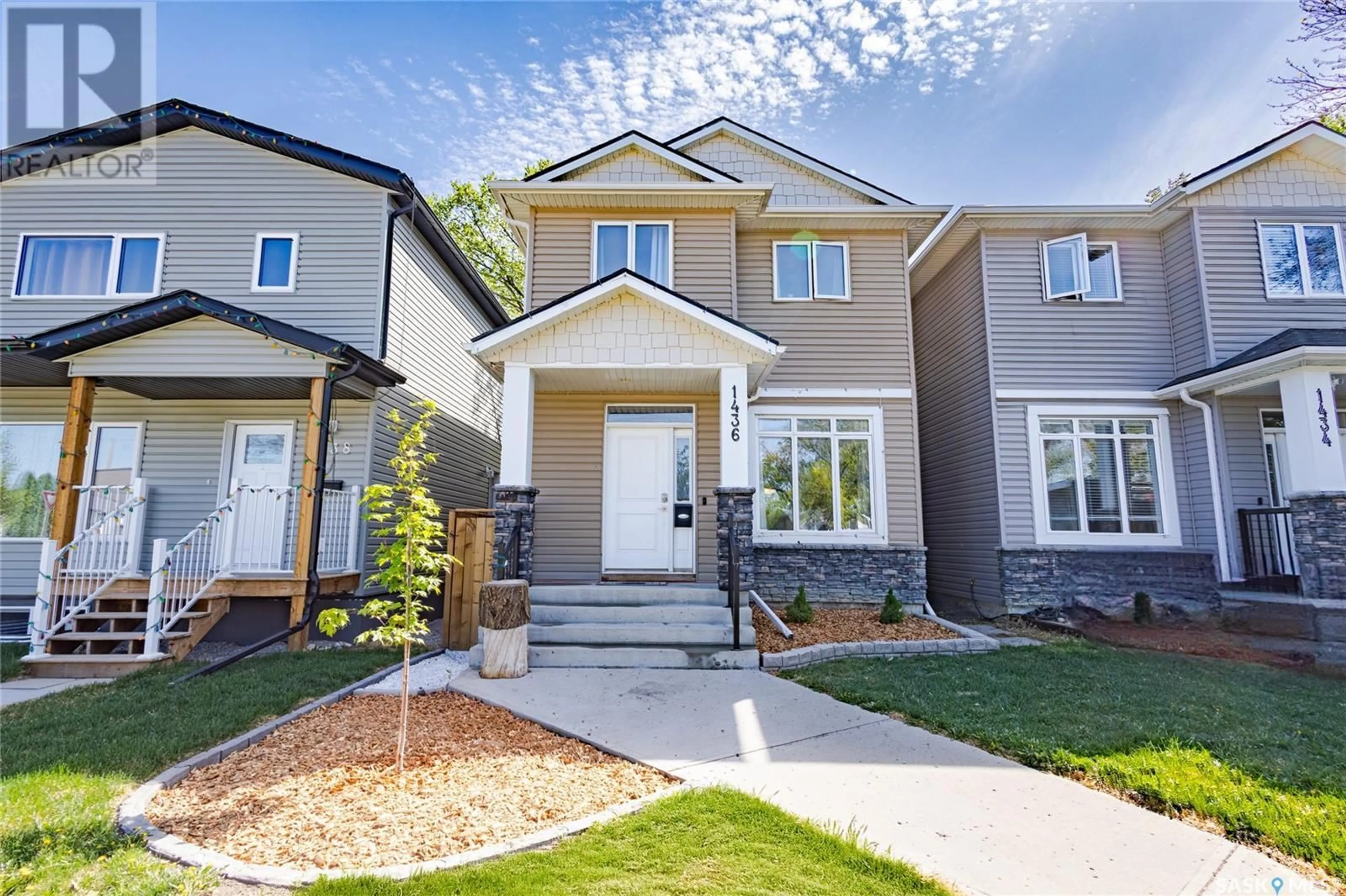 Home with vinyl exterior material, street for N - 1436 1ST AVENUE, Saskatoon Saskatchewan S7K1Z1