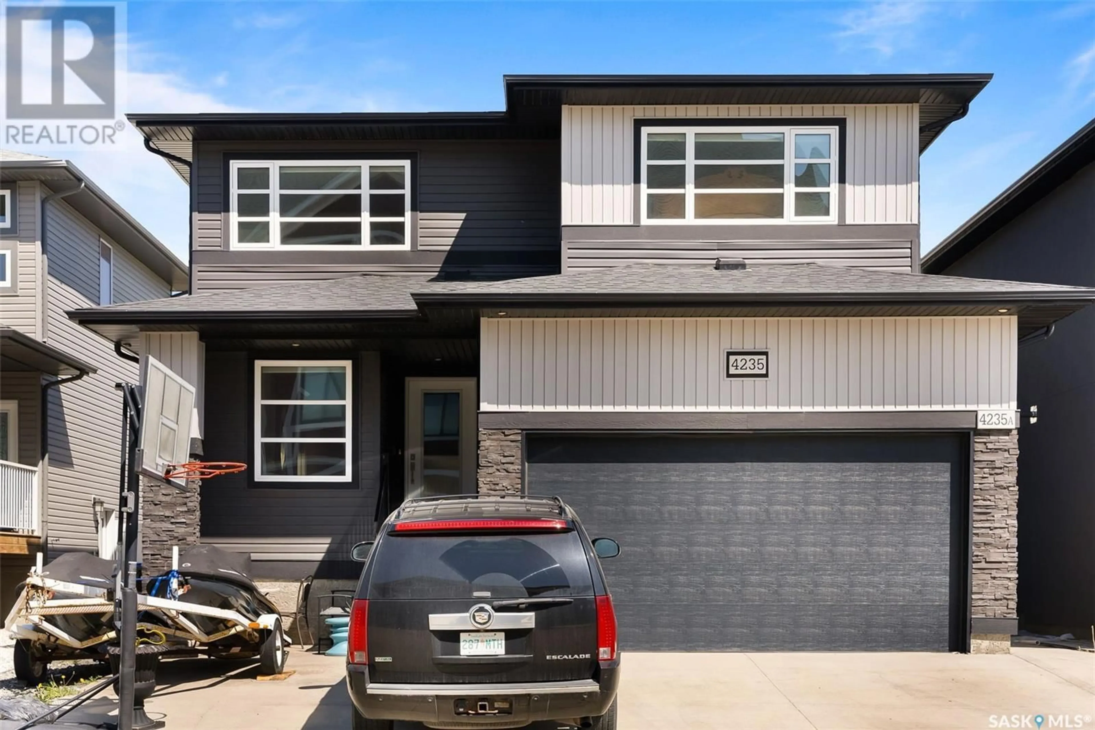 Home with vinyl exterior material, street for 4235 WAKELING STREET, Regina Saskatchewan S4W0L7