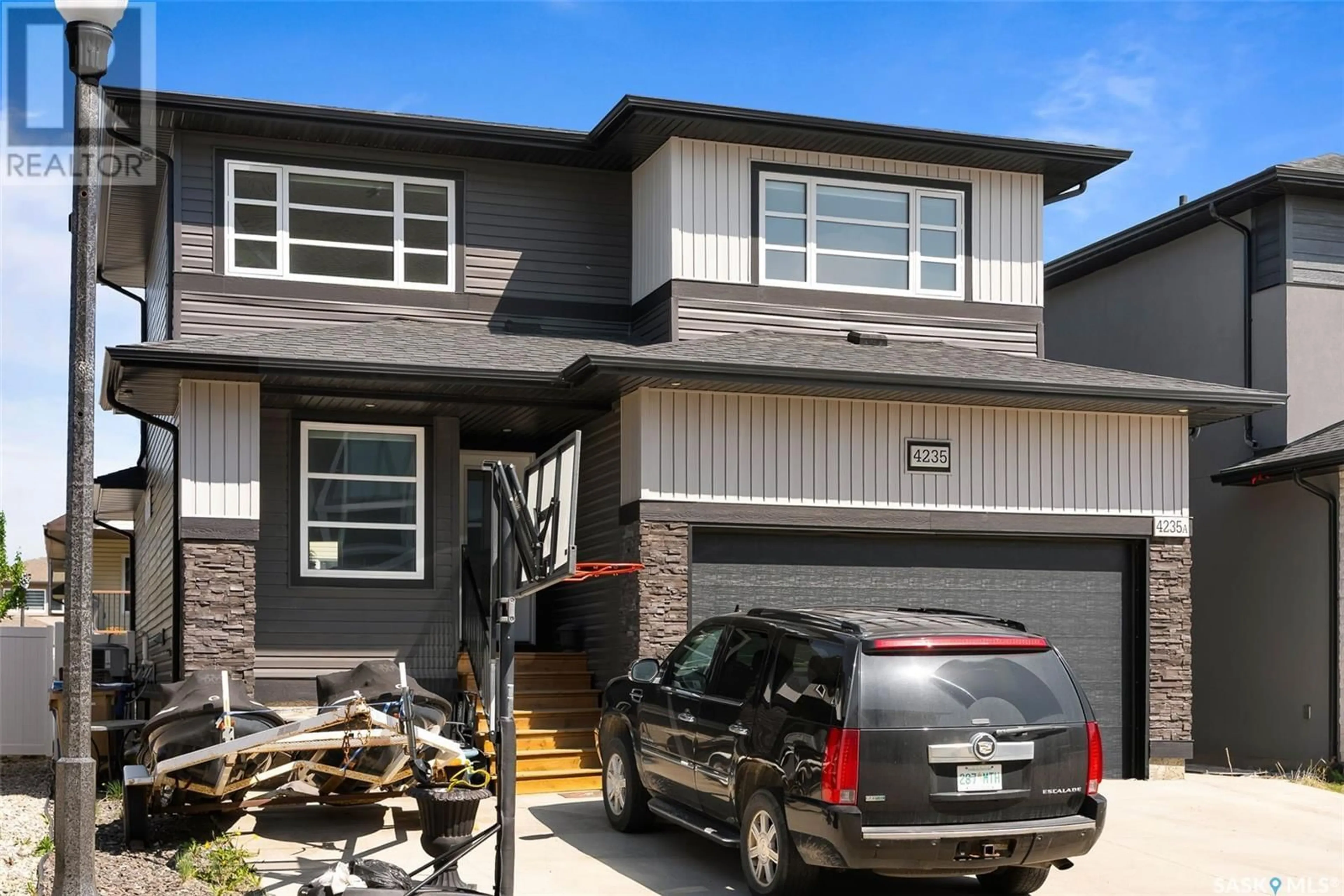 Home with vinyl exterior material, street for 4235 WAKELING STREET, Regina Saskatchewan S4W0L7