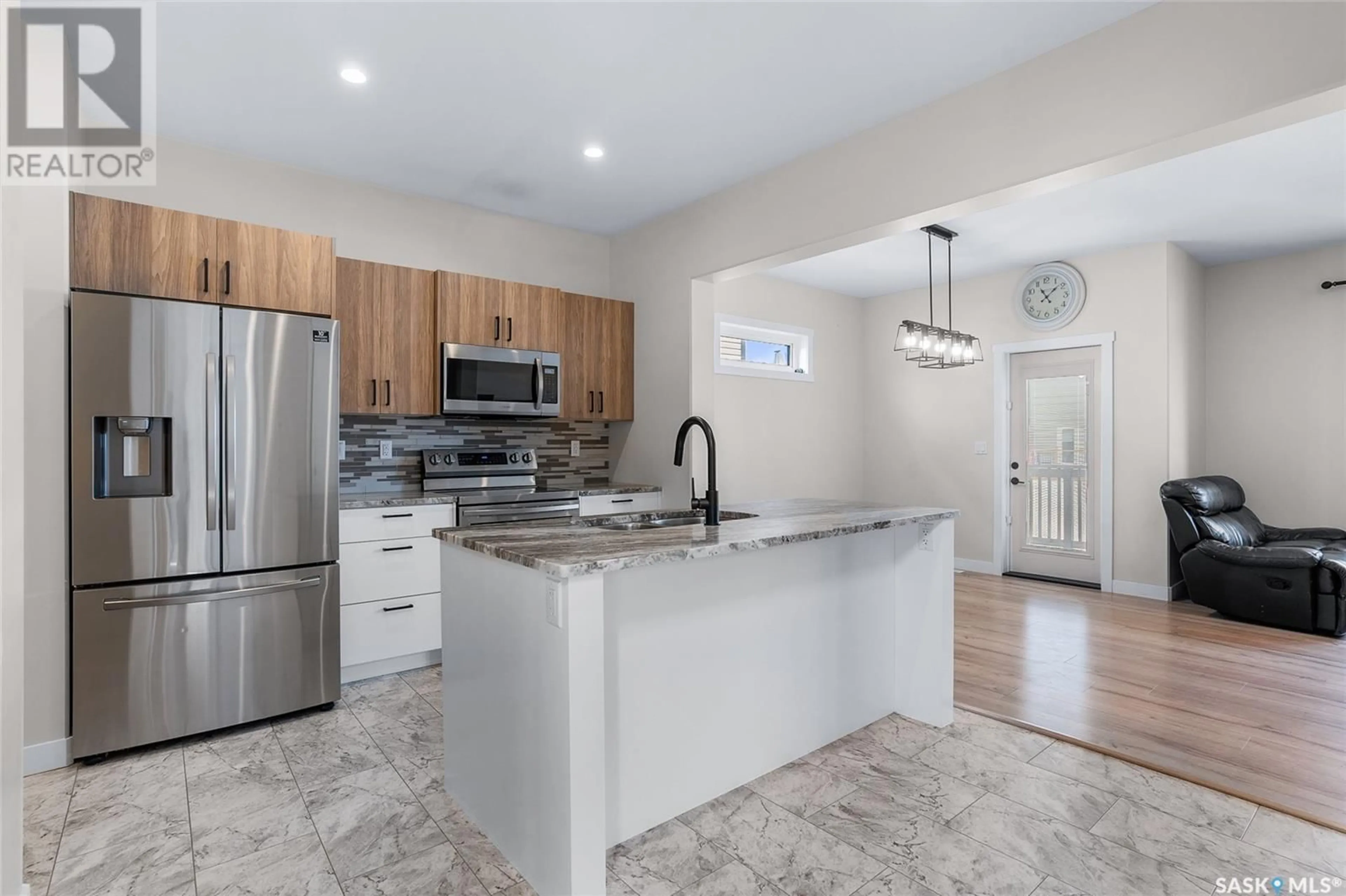 Open concept kitchen, ceramic/tile floor for 263 BARRETT STREET, Saskatoon Saskatchewan S7W1C6