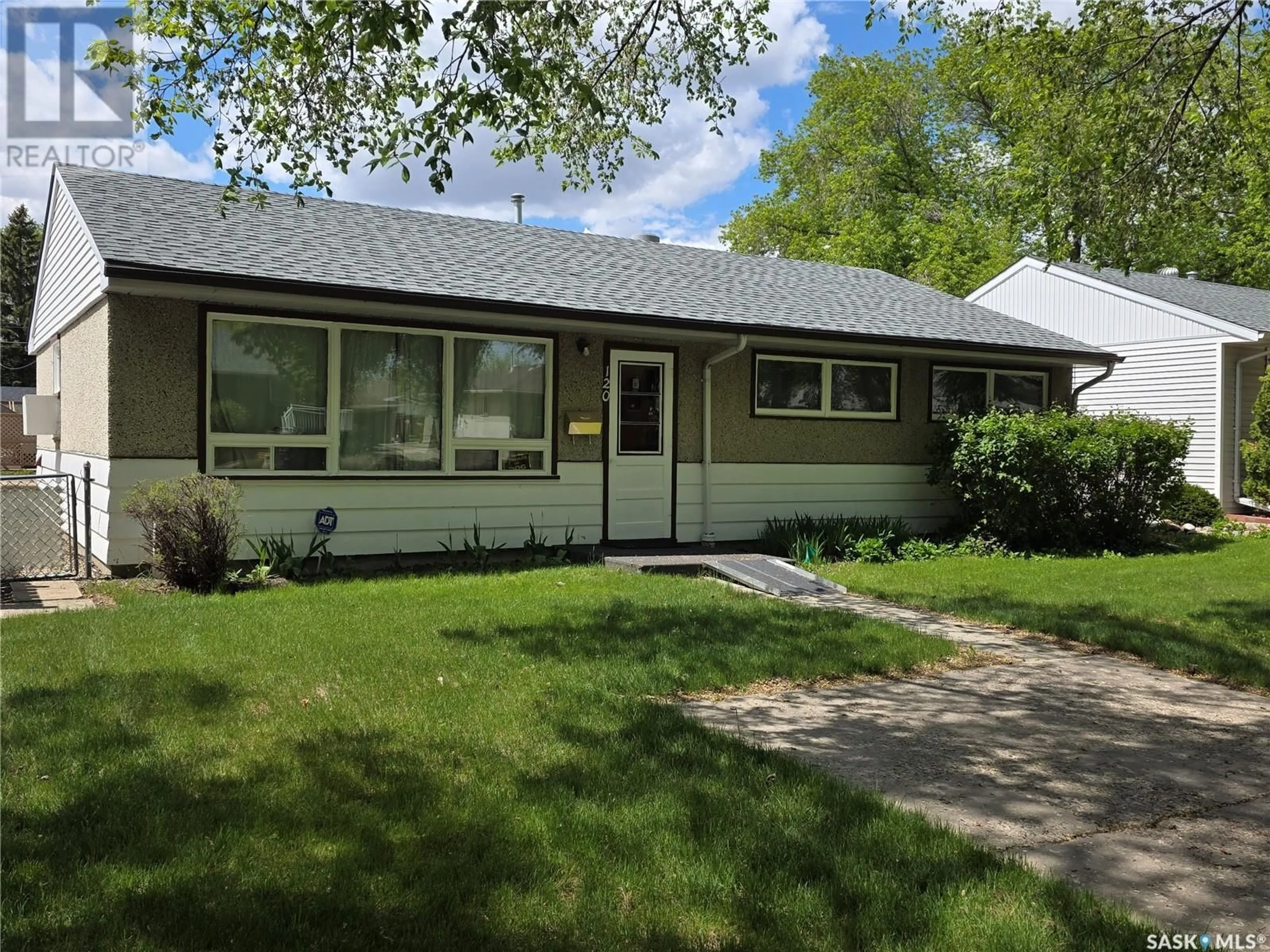Home with vinyl exterior material, street for 120 RAE STREET, Regina Saskatchewan S4R3L6