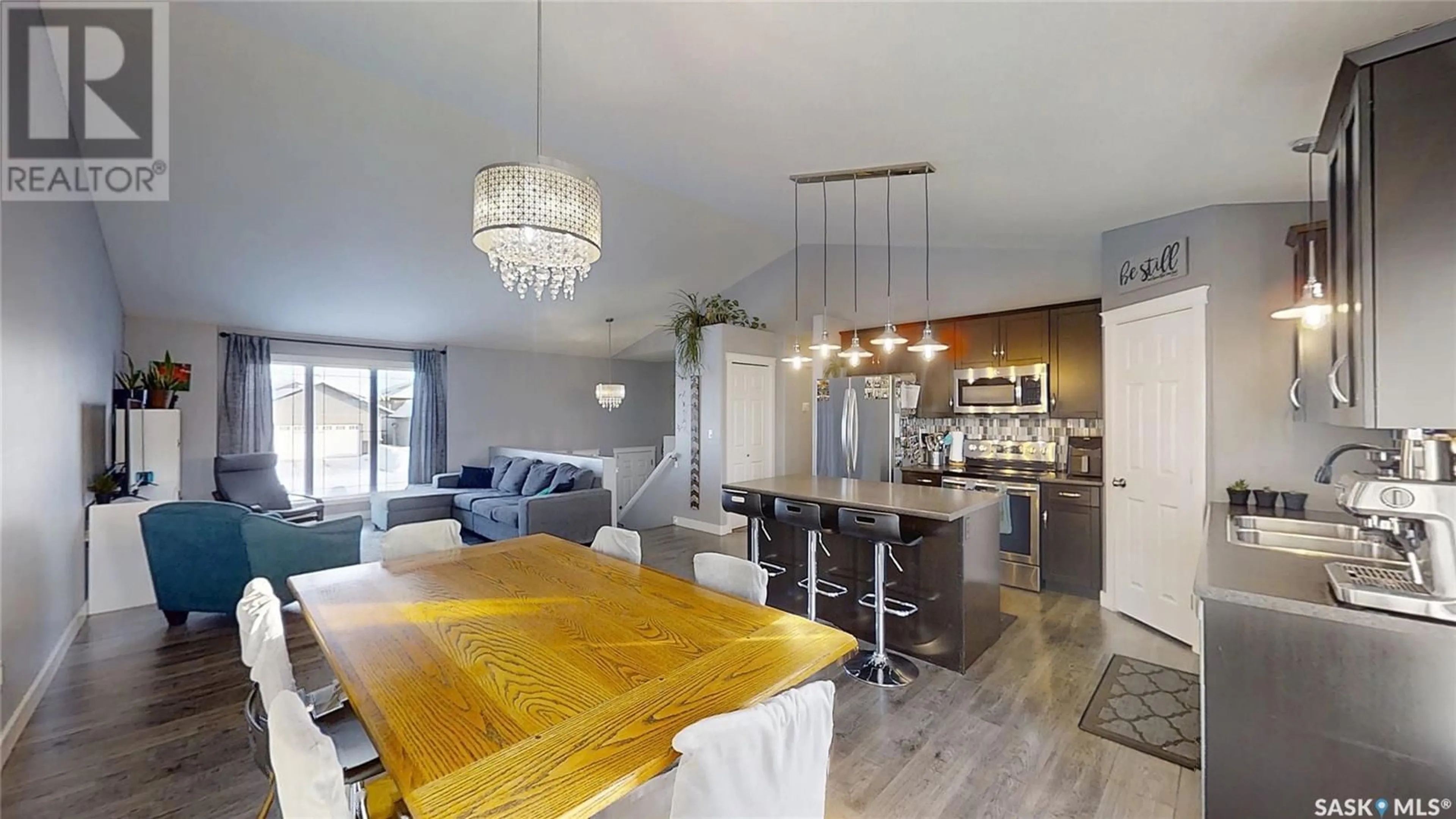 Open concept kitchen, wood/laminate floor for 713 SARAZEN DRIVE, Warman Saskatchewan S0K4S4