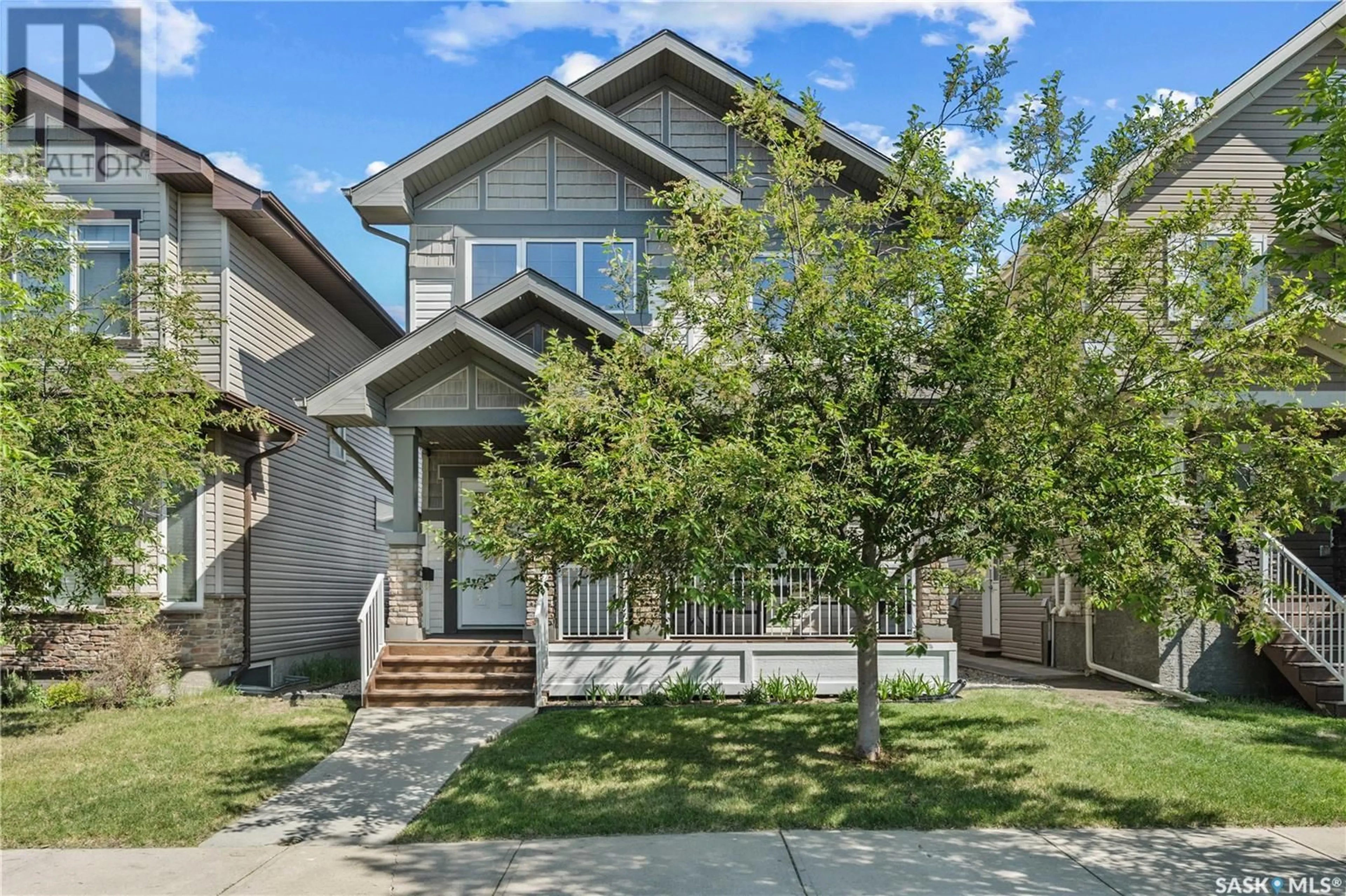 Home with vinyl exterior material, street for 8826 SHERWOOD DRIVE, Regina Saskatchewan S4Y0B6