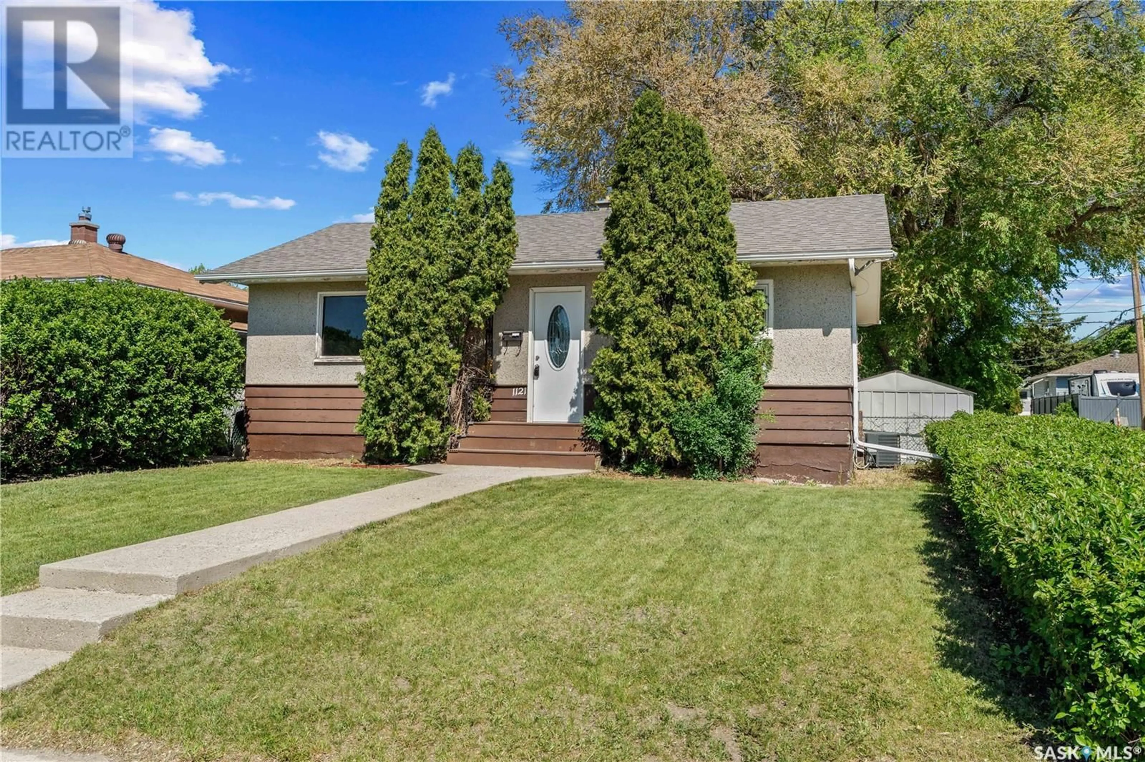 Home with vinyl exterior material, street for 1121 GRACE STREET, Regina Saskatchewan S4T5M6