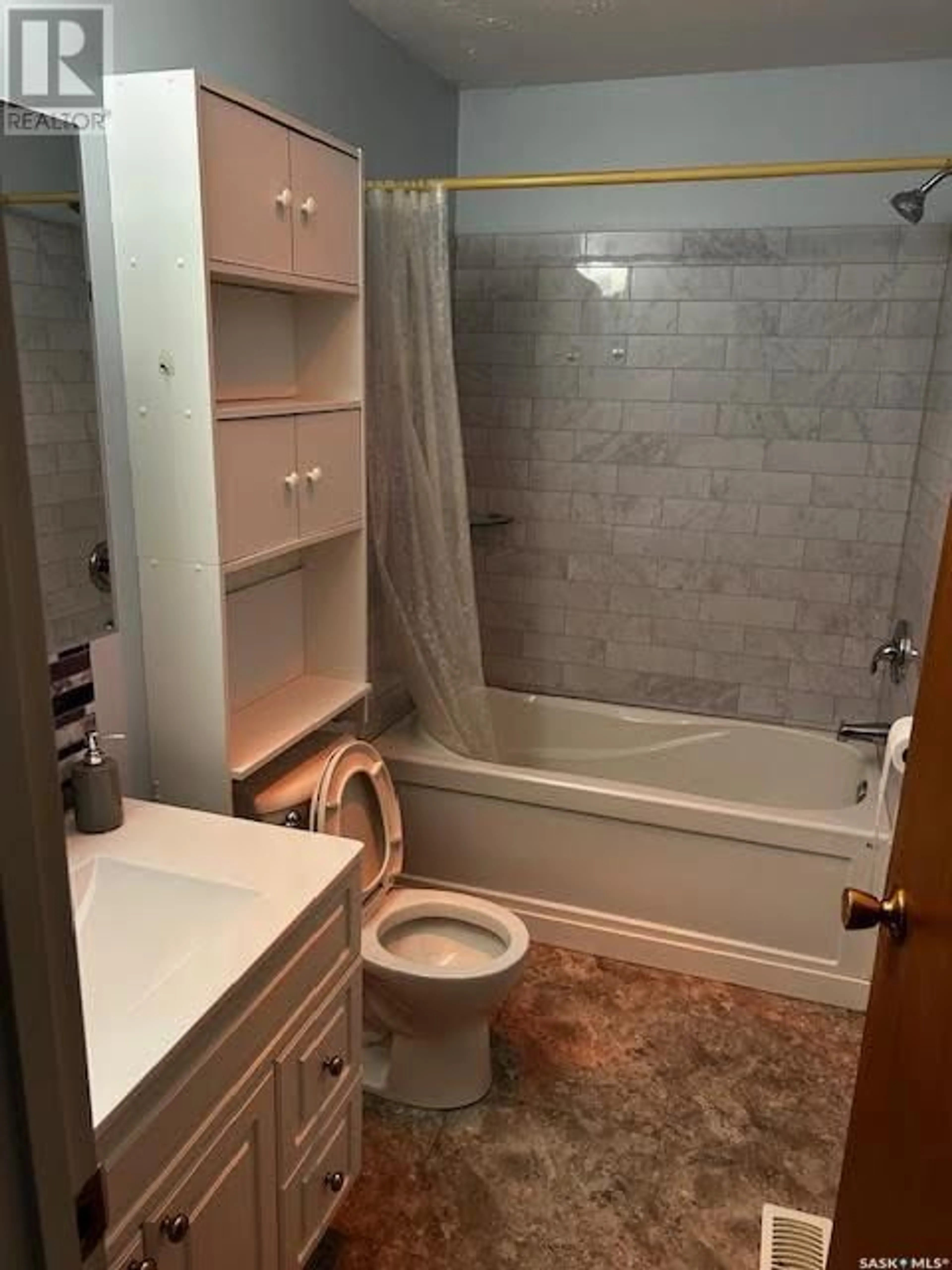 Standard bathroom, ceramic/tile floor for 107 ARTHUR STREET, Cut Knife Saskatchewan S0M0N0