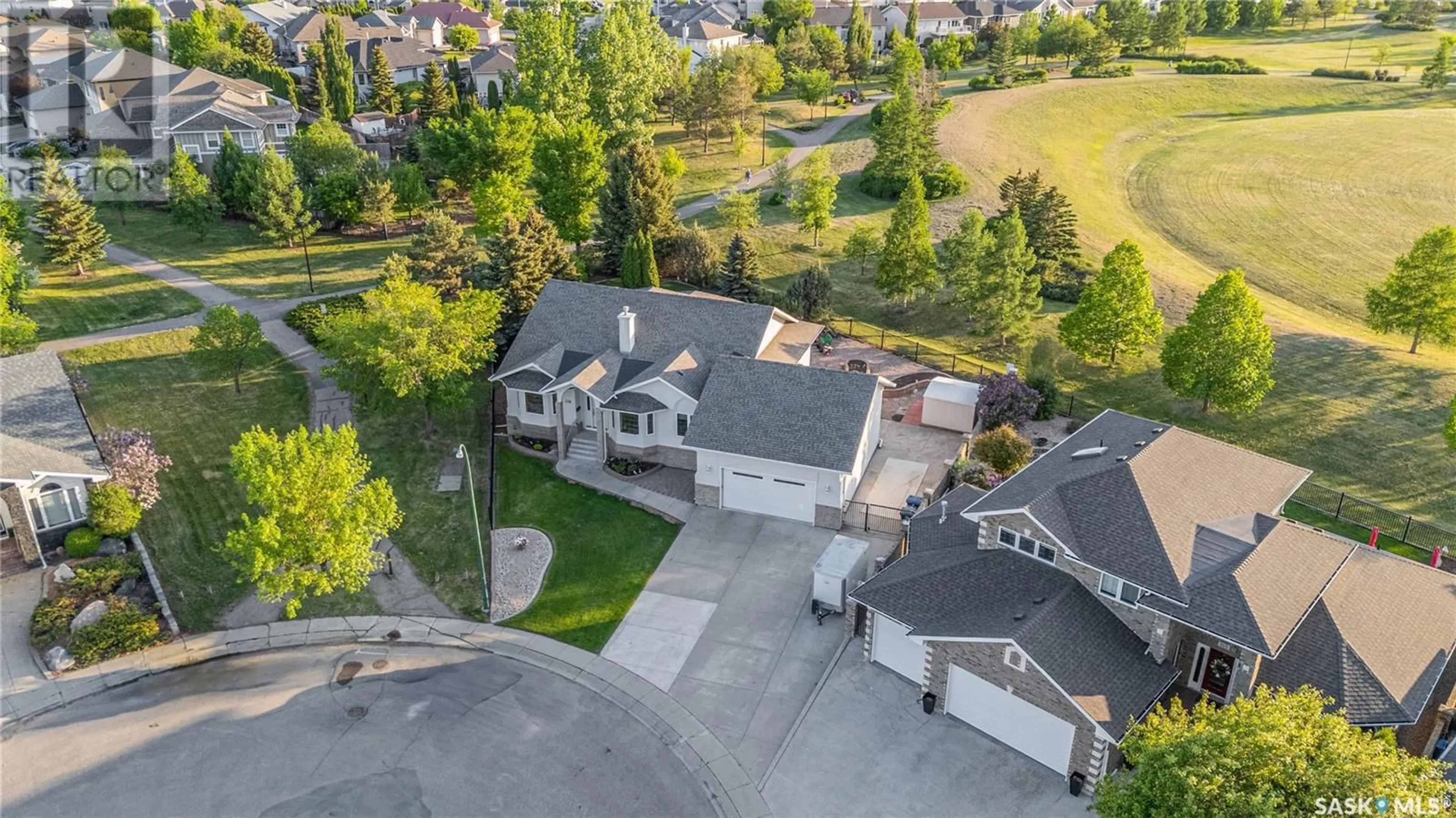 A pic from outside/outdoor area/front of a property/back of a property/a pic from drone, street for 319 BROOKMORE CRESCENT, Saskatoon Saskatchewan S7V1C1