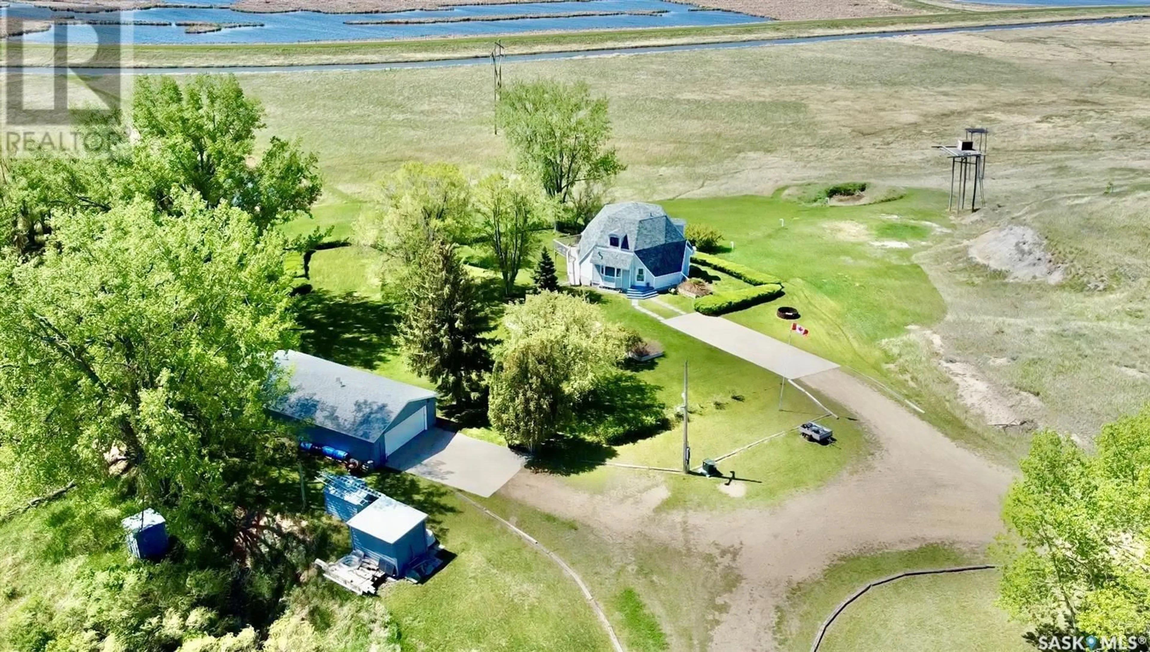 A pic from outside/outdoor area/front of a property/back of a property/a pic from drone, water/lake/river/ocean view for RM of Estevan SOURIS VALLEY VIEWS, Estevan Saskatchewan S4A2H7