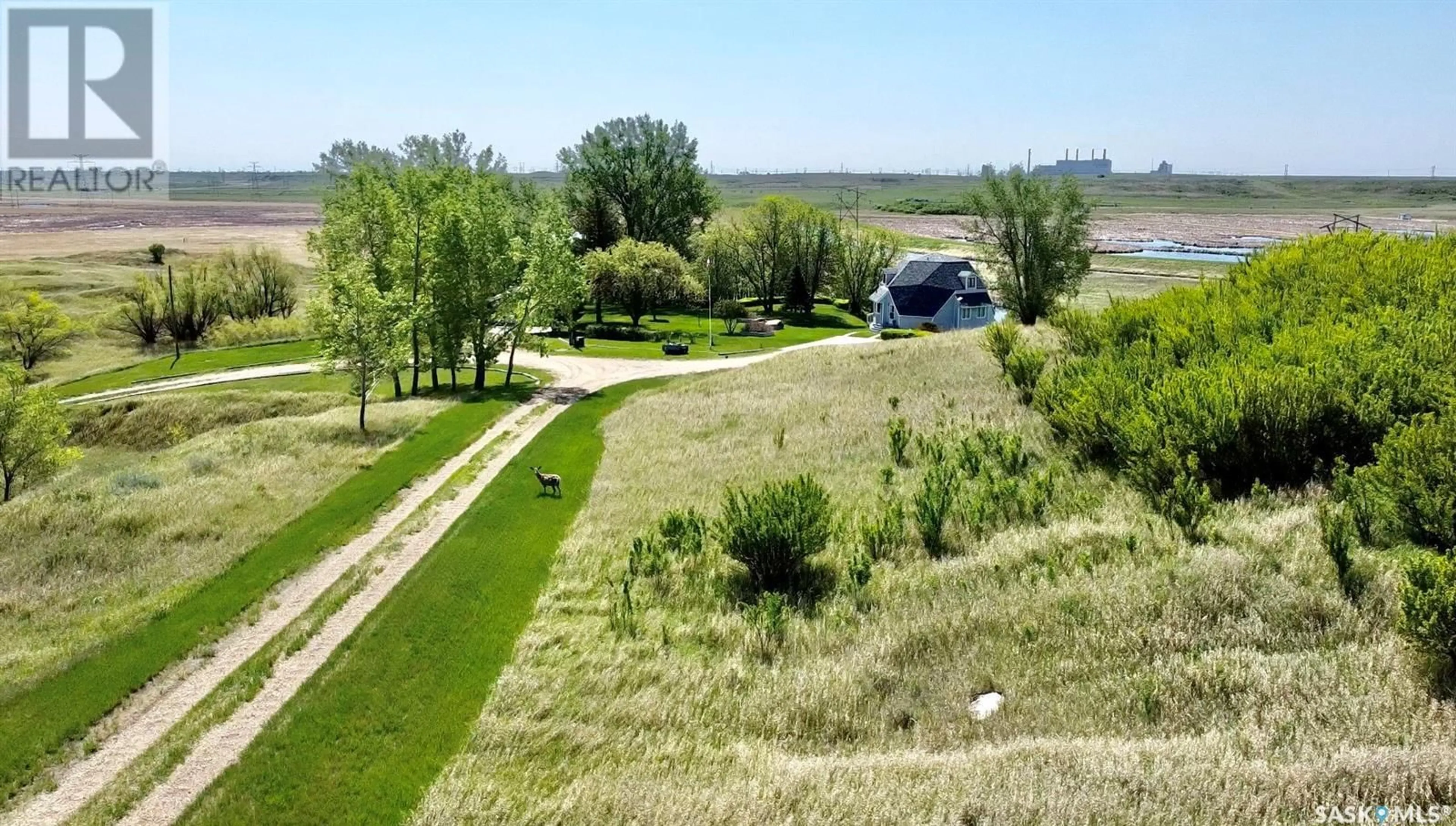 A pic from outside/outdoor area/front of a property/back of a property/a pic from drone, water/lake/river/ocean view for RM of Estevan SOURIS VALLEY VIEWS, Estevan Saskatchewan S4A2H7