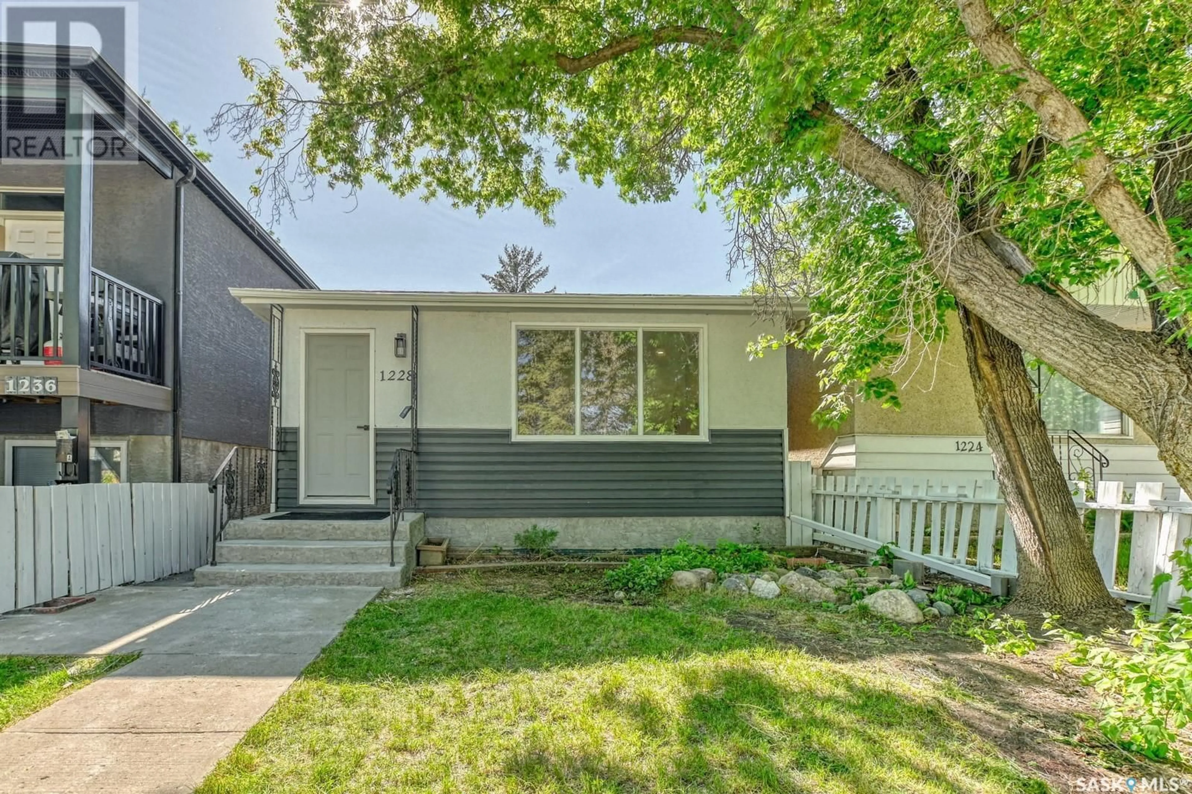 Home with vinyl exterior material, street for 1228 WALLACE STREET, Regina Saskatchewan S4N3Z3