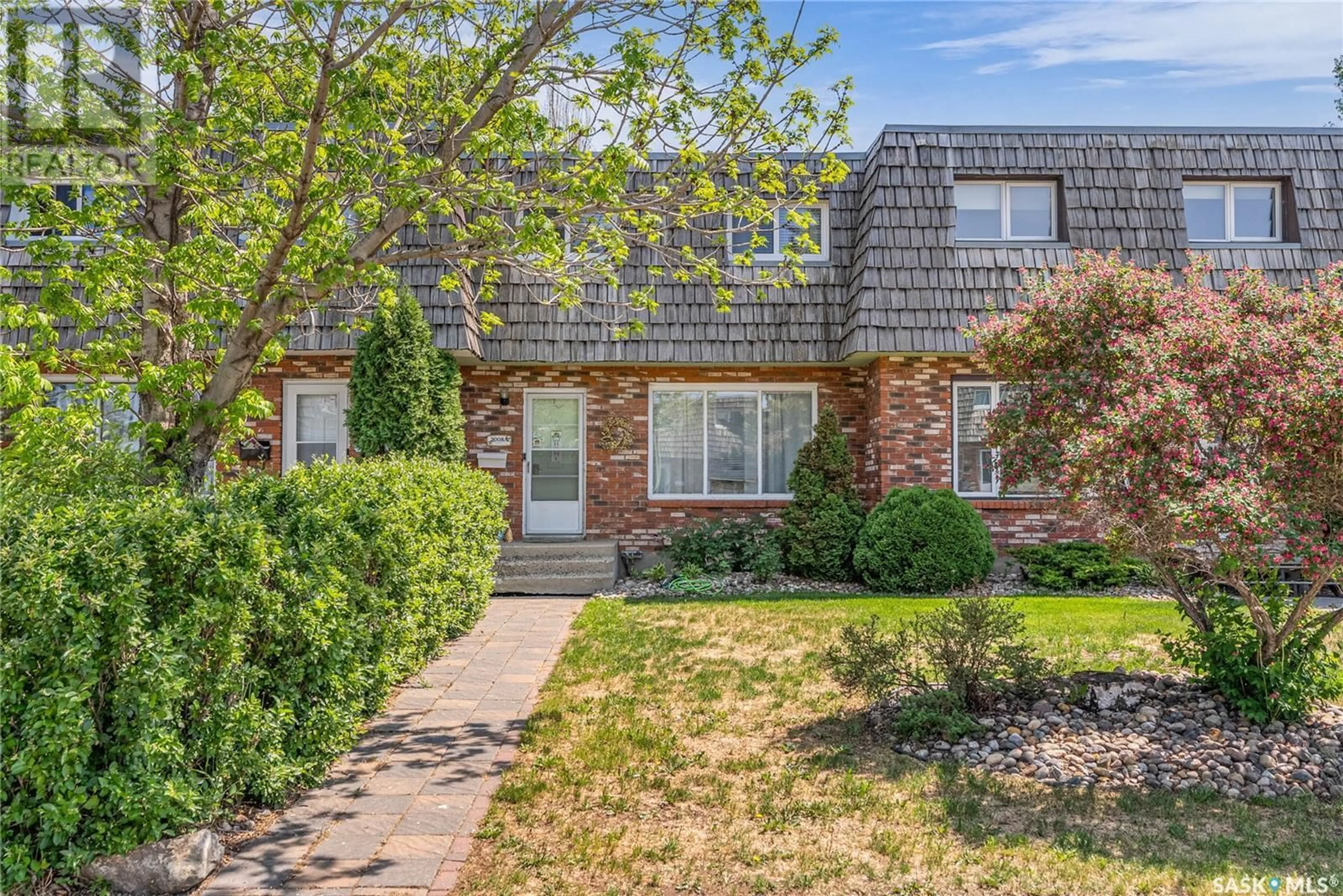 Home with brick exterior material, street for 2008 FOLEY DRIVE, North Battleford Saskatchewan S9A3G9