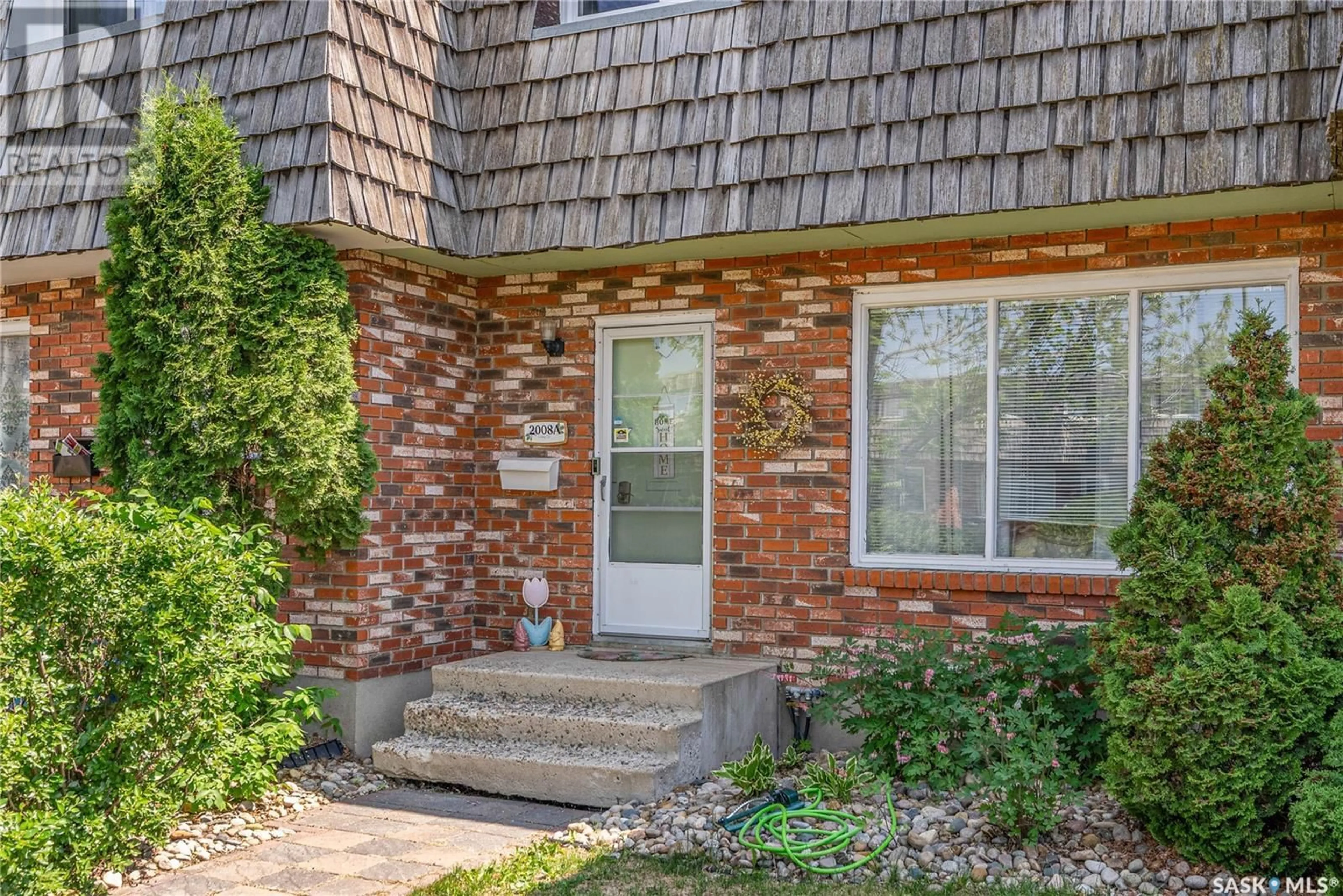Home with brick exterior material, street for 2008 FOLEY DRIVE, North Battleford Saskatchewan S9A3G9