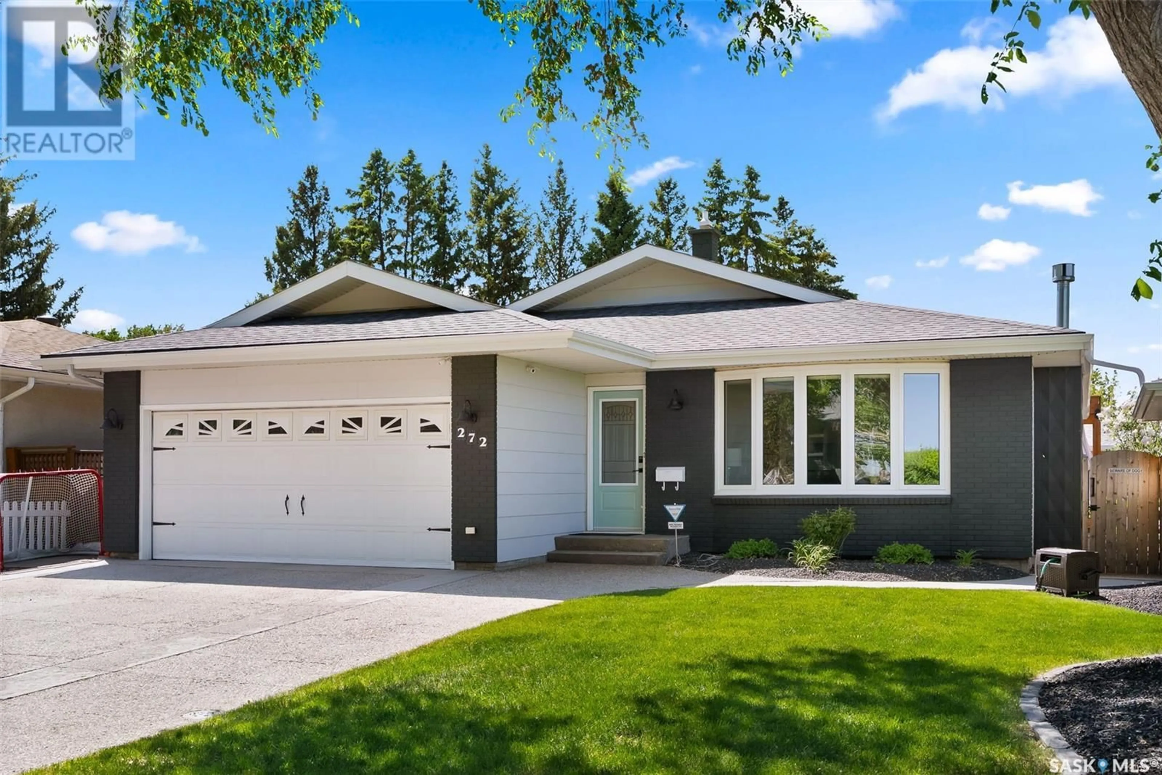 Home with vinyl exterior material, street for 272 WELLS STREET, Regina Saskatchewan S4R6T2