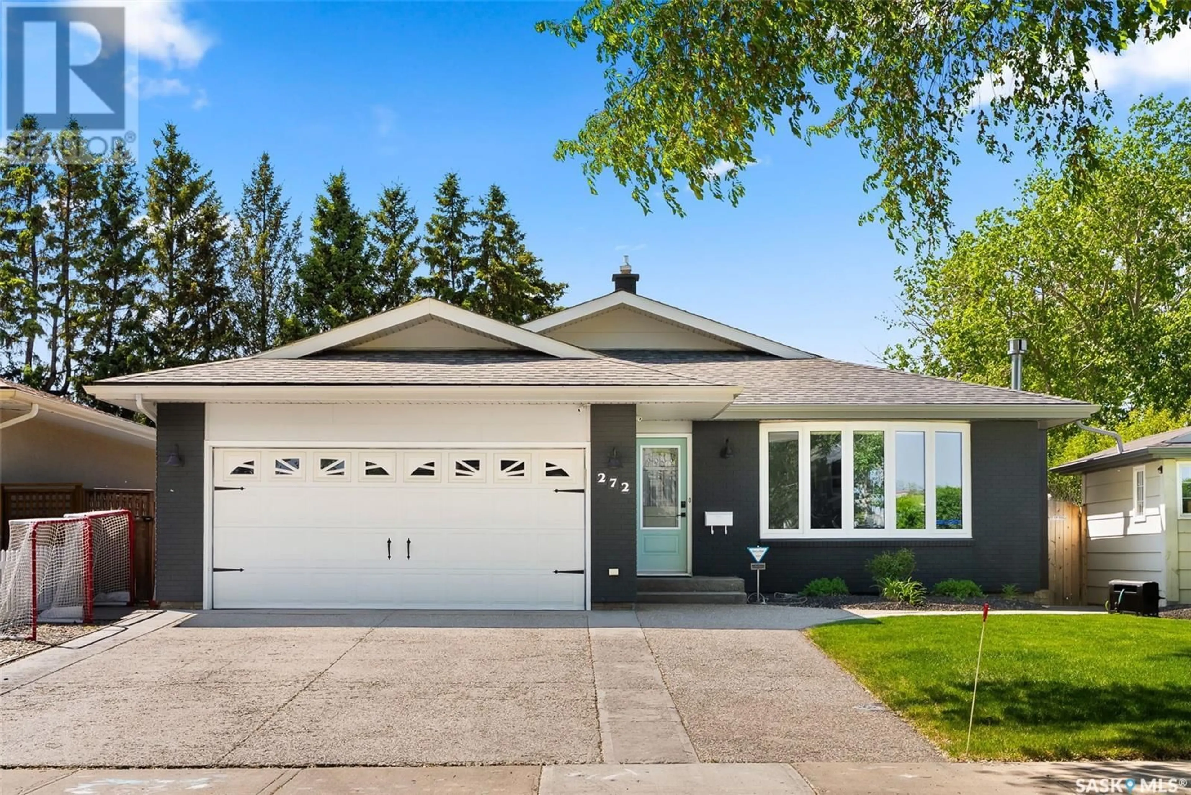 Home with vinyl exterior material, street for 272 WELLS STREET, Regina Saskatchewan S4R6T2