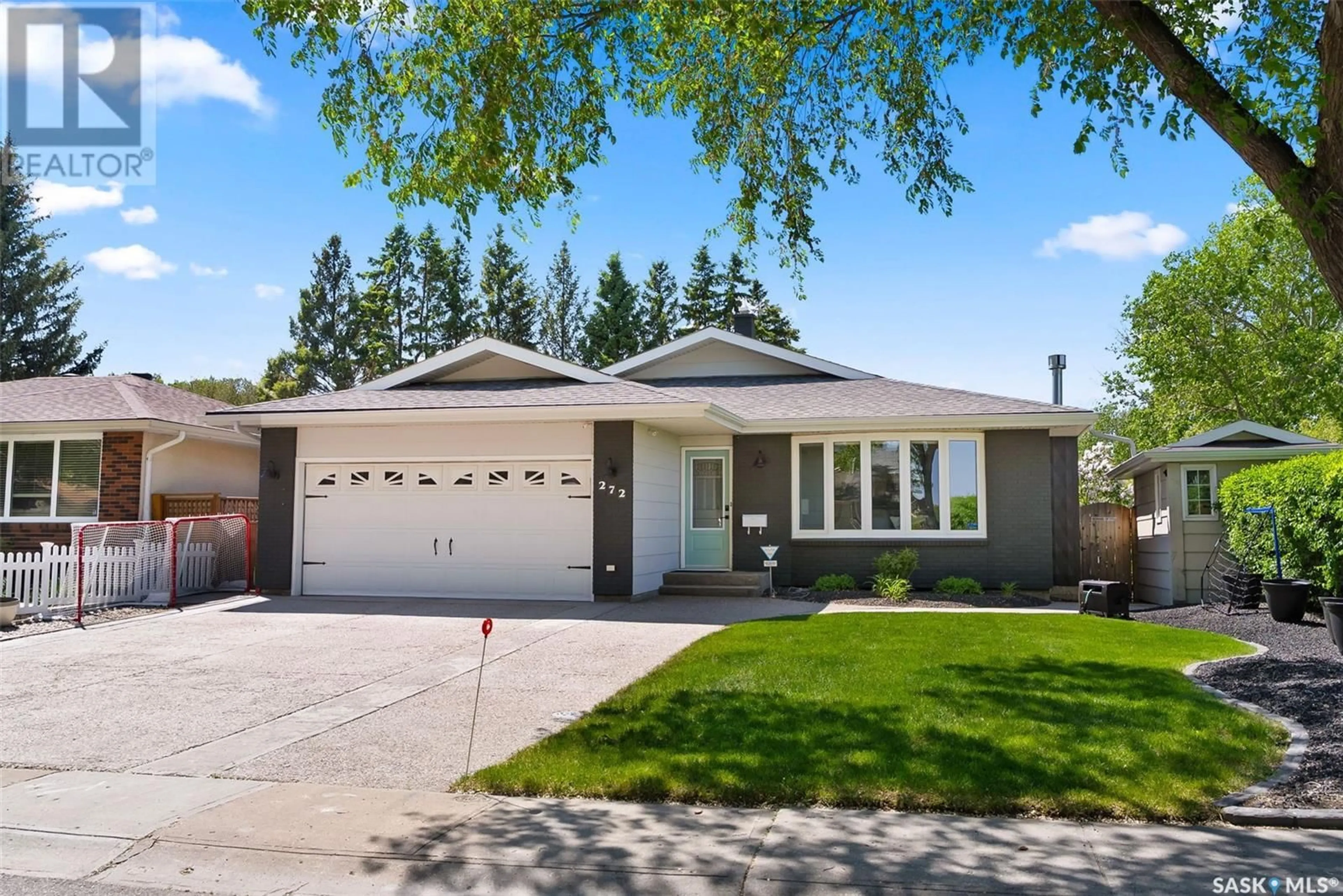 Home with vinyl exterior material, street for 272 WELLS STREET, Regina Saskatchewan S4R6T2