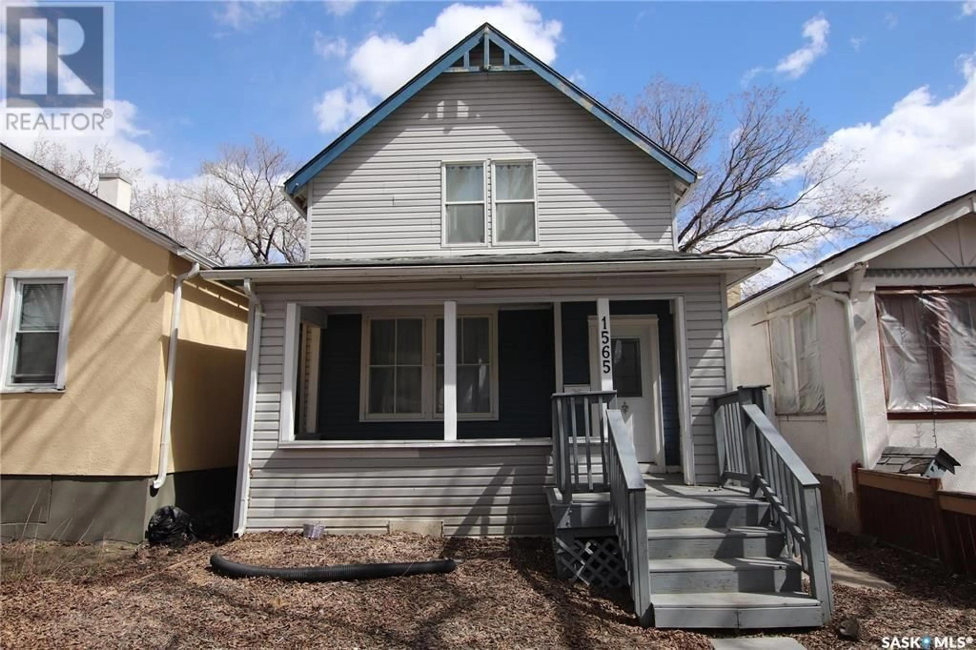 Home with vinyl exterior material, street for 1565 ROBINSON STREET, Regina Saskatchewan S4T2Z1