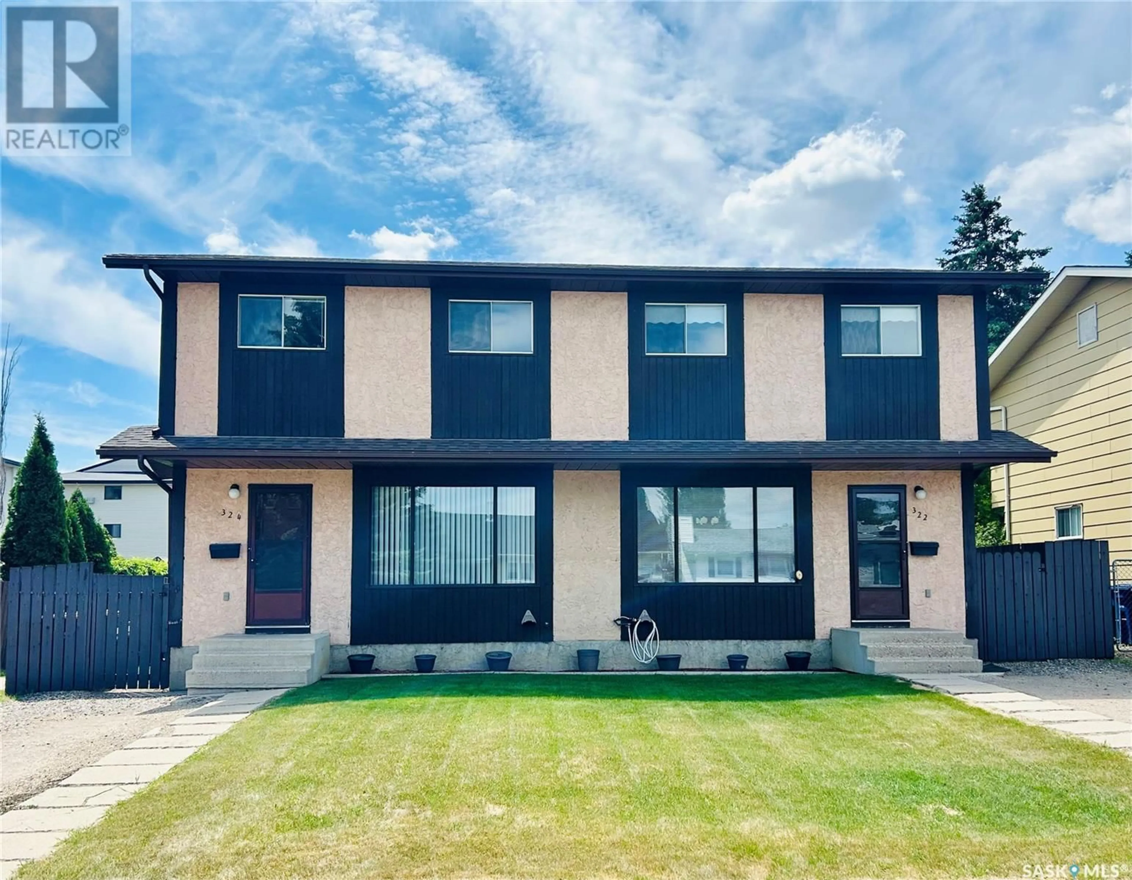 Home with vinyl exterior material, street for 324-322 COCHIN CRESCENT, Saskatoon Saskatchewan S7K4T4