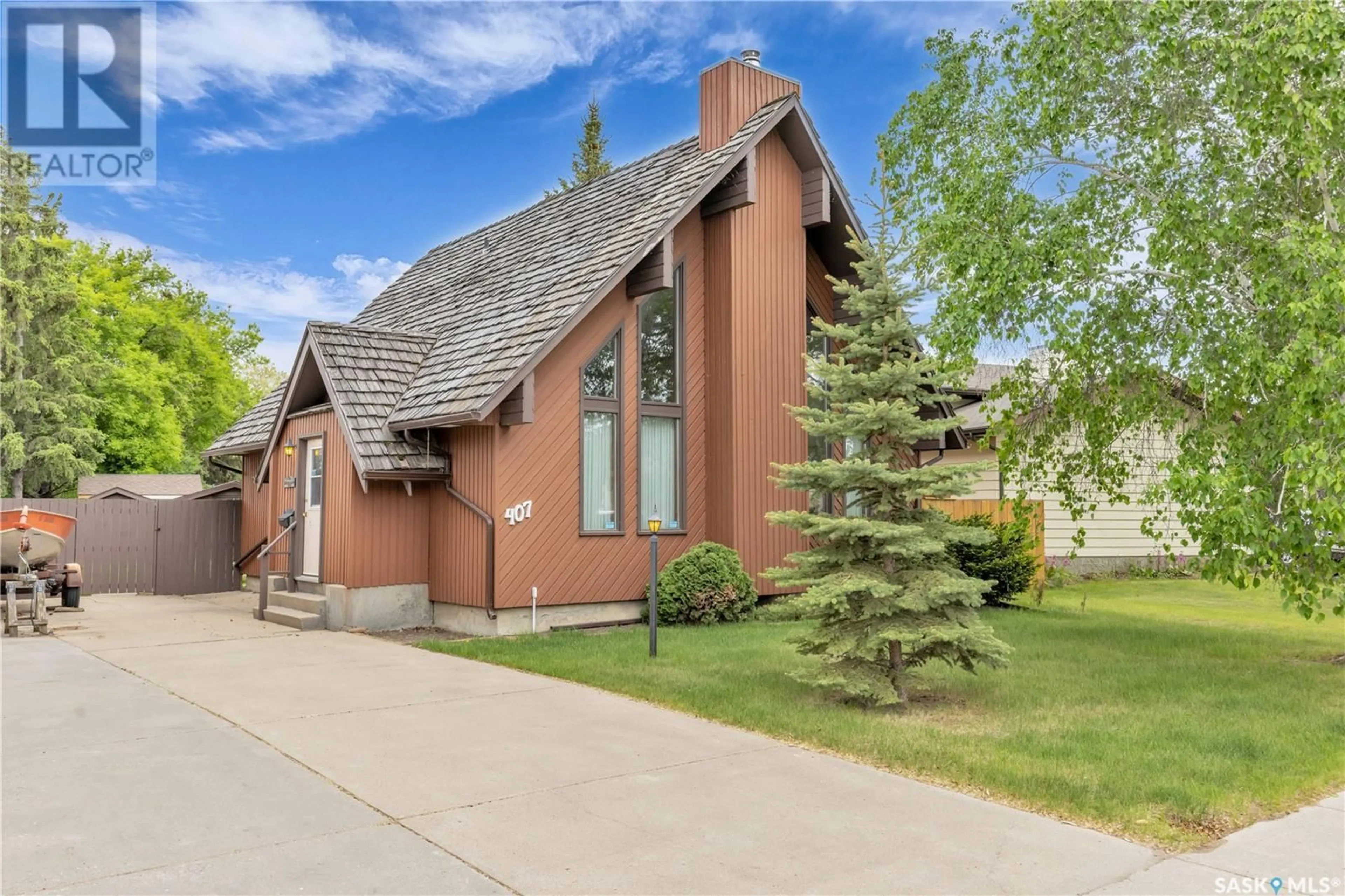 Home with brick exterior material, street for 407 DAVID KNIGHT LANE, Saskatoon Saskatchewan S7K5M1
