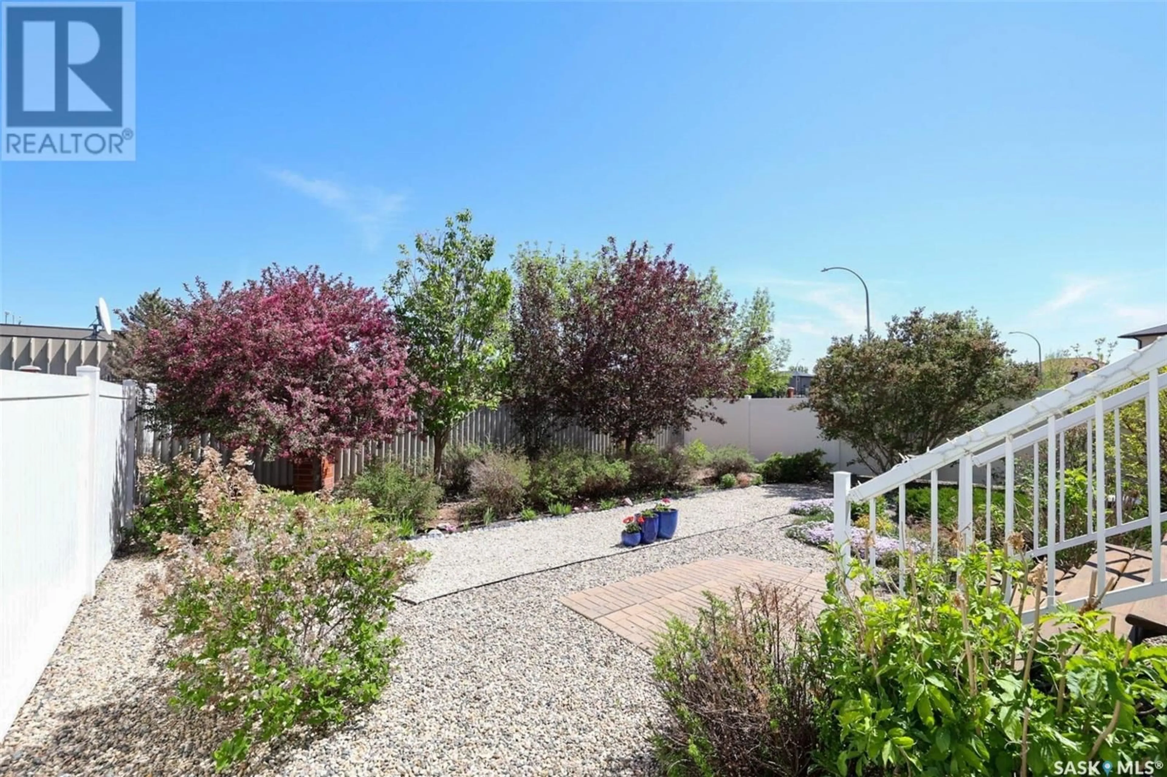 A pic from outside/outdoor area/front of a property/back of a property/a pic from drone, street for 7122 WASCANA COVE DRIVE, Regina Saskatchewan S4V3G1