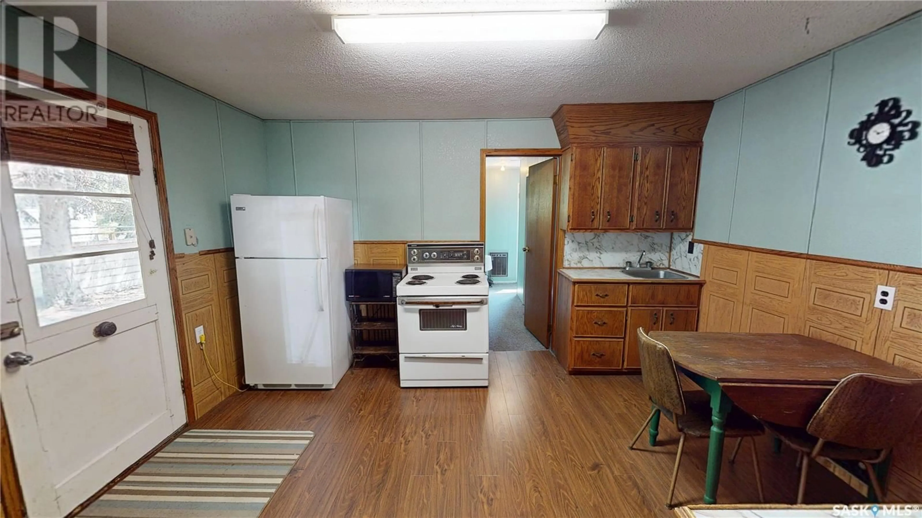 Standard kitchen, wood/laminate floor for 17 ASH CRESCENT, Moose Mountain Provincial Park Saskatchewan S0C2S0
