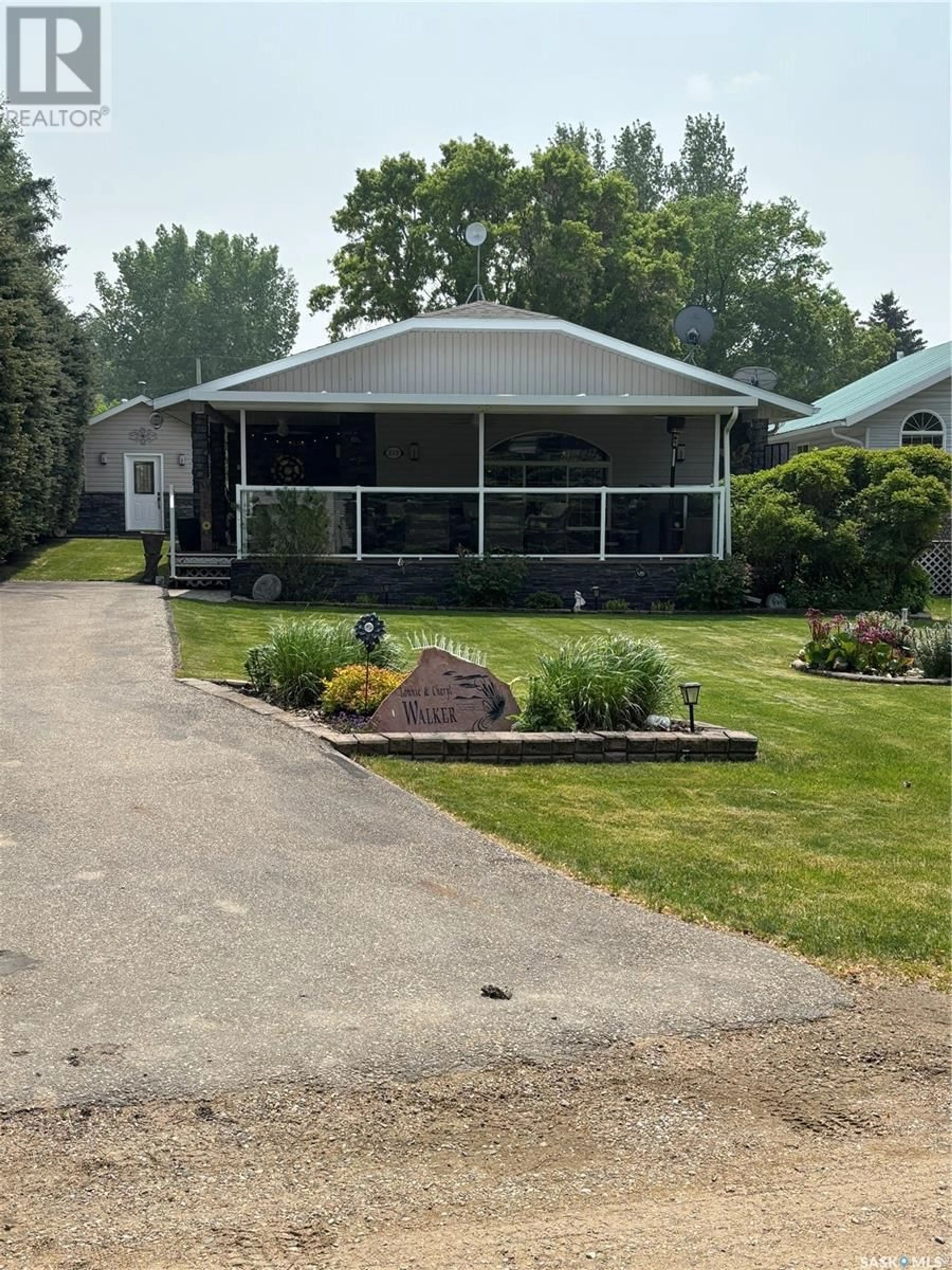 Home with vinyl exterior material, street for 219 SOVEREIGN CRESCENT, Coteau Beach Saskatchewan S0L0G0