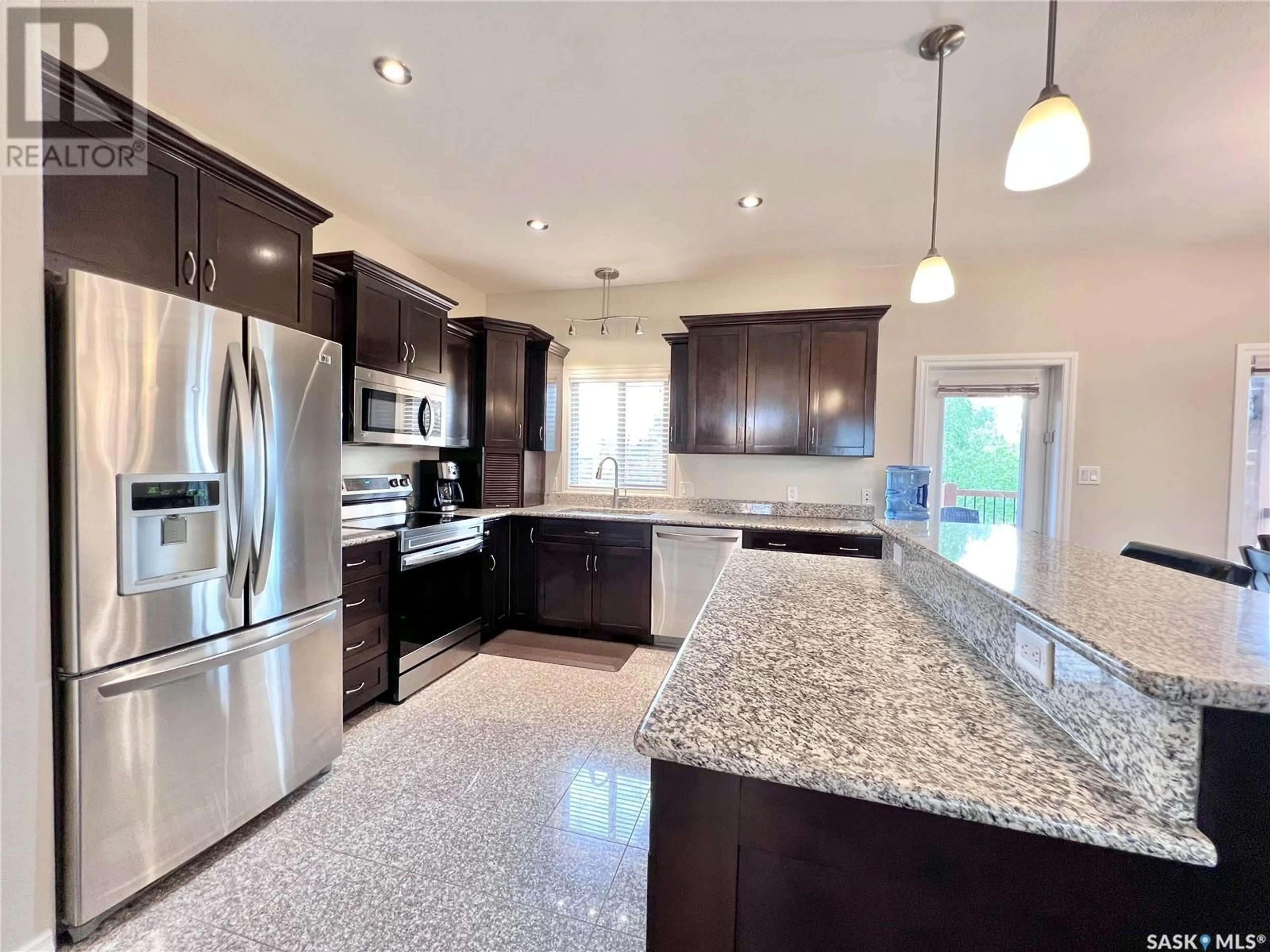 Open concept kitchen, ceramic/tile floor for 104 4TH STREET, Milden Saskatchewan S0L2L0