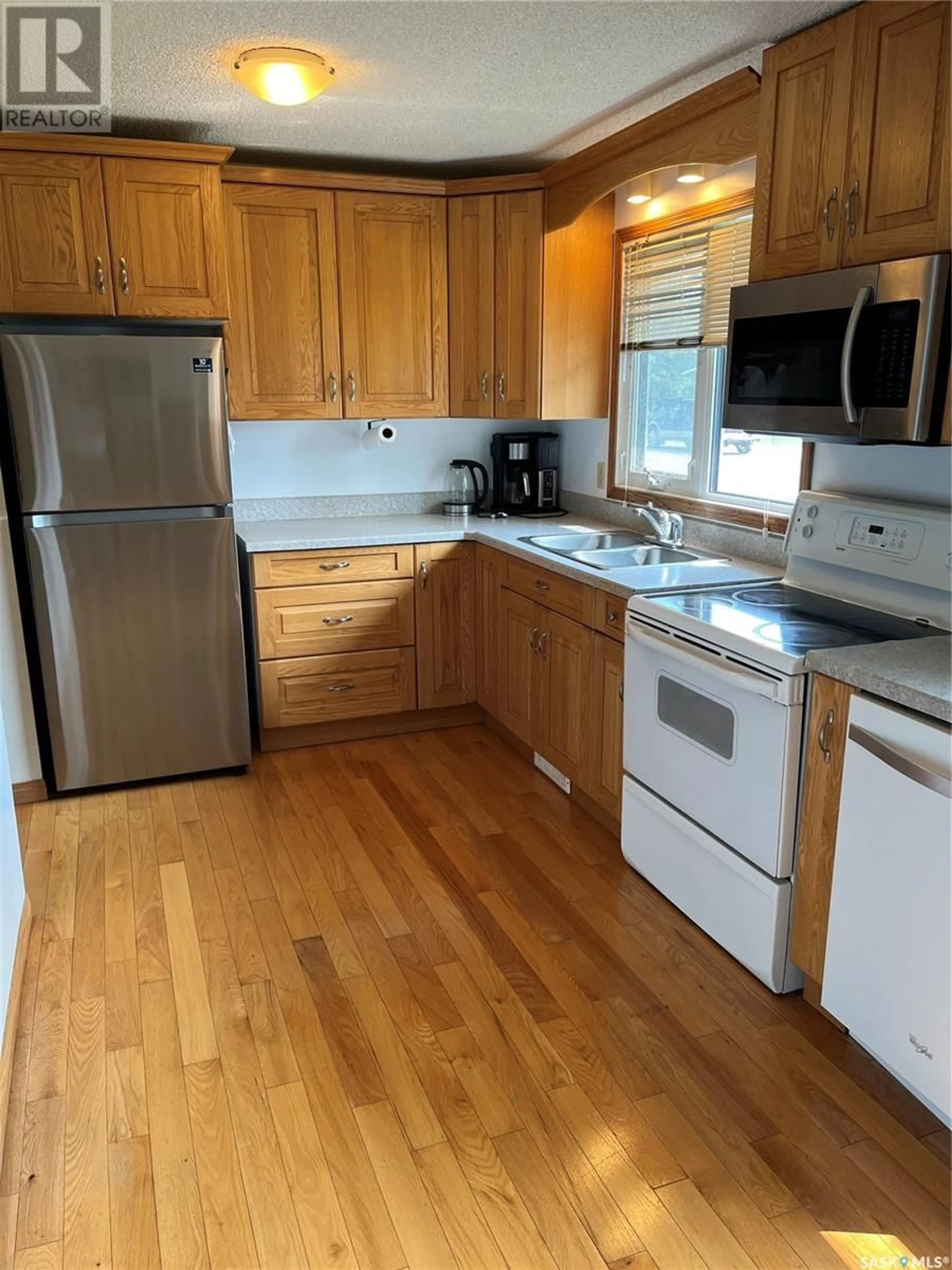 Standard kitchen, wood/laminate floor for 215 17TH STREET, Weyburn Saskatchewan S4H2P1