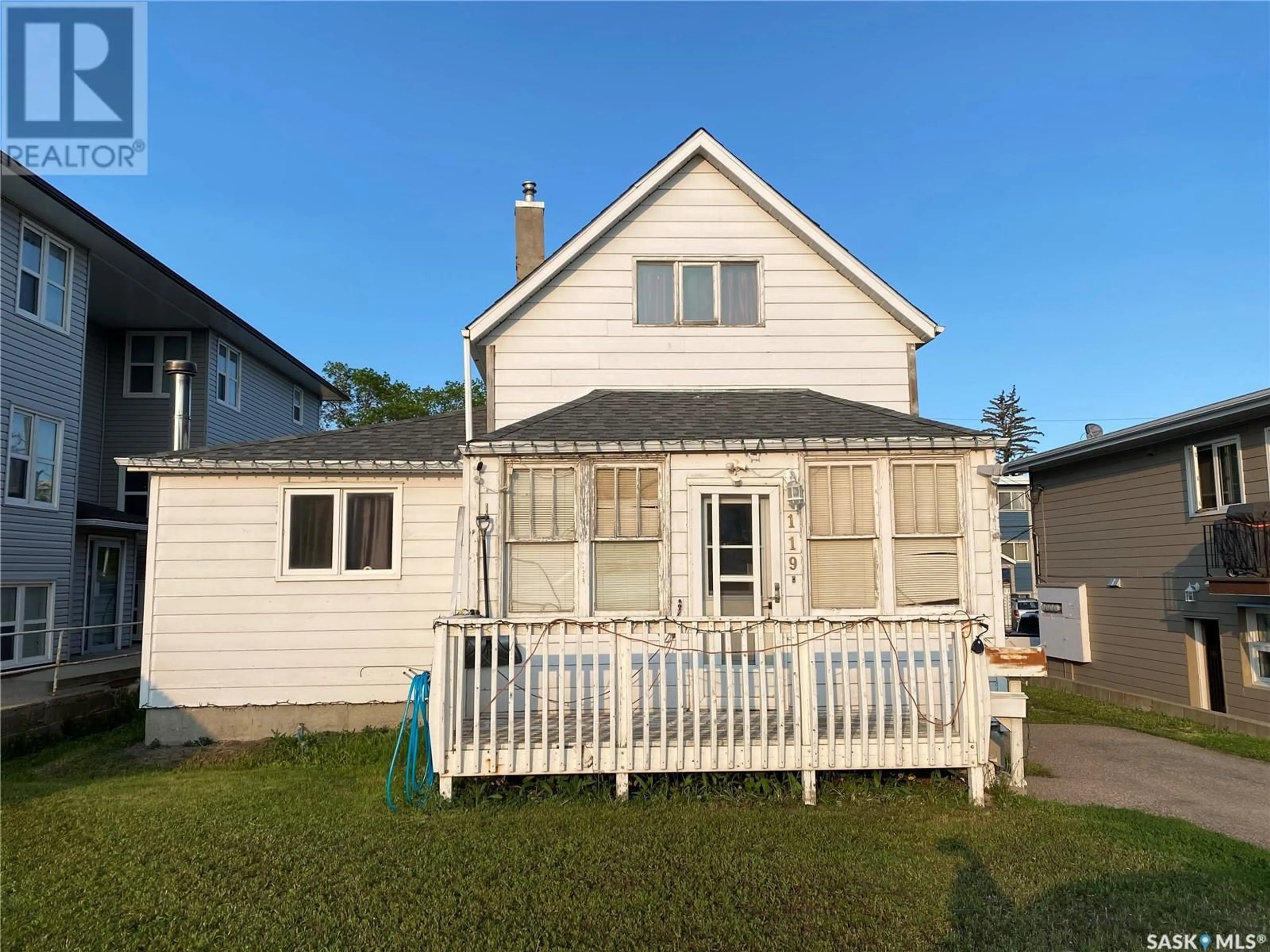 A pic from outside/outdoor area/front of a property/back of a property/a pic from drone, unknown for 119 3RD AVENUE, Swift Current Saskatchewan S9H2G4