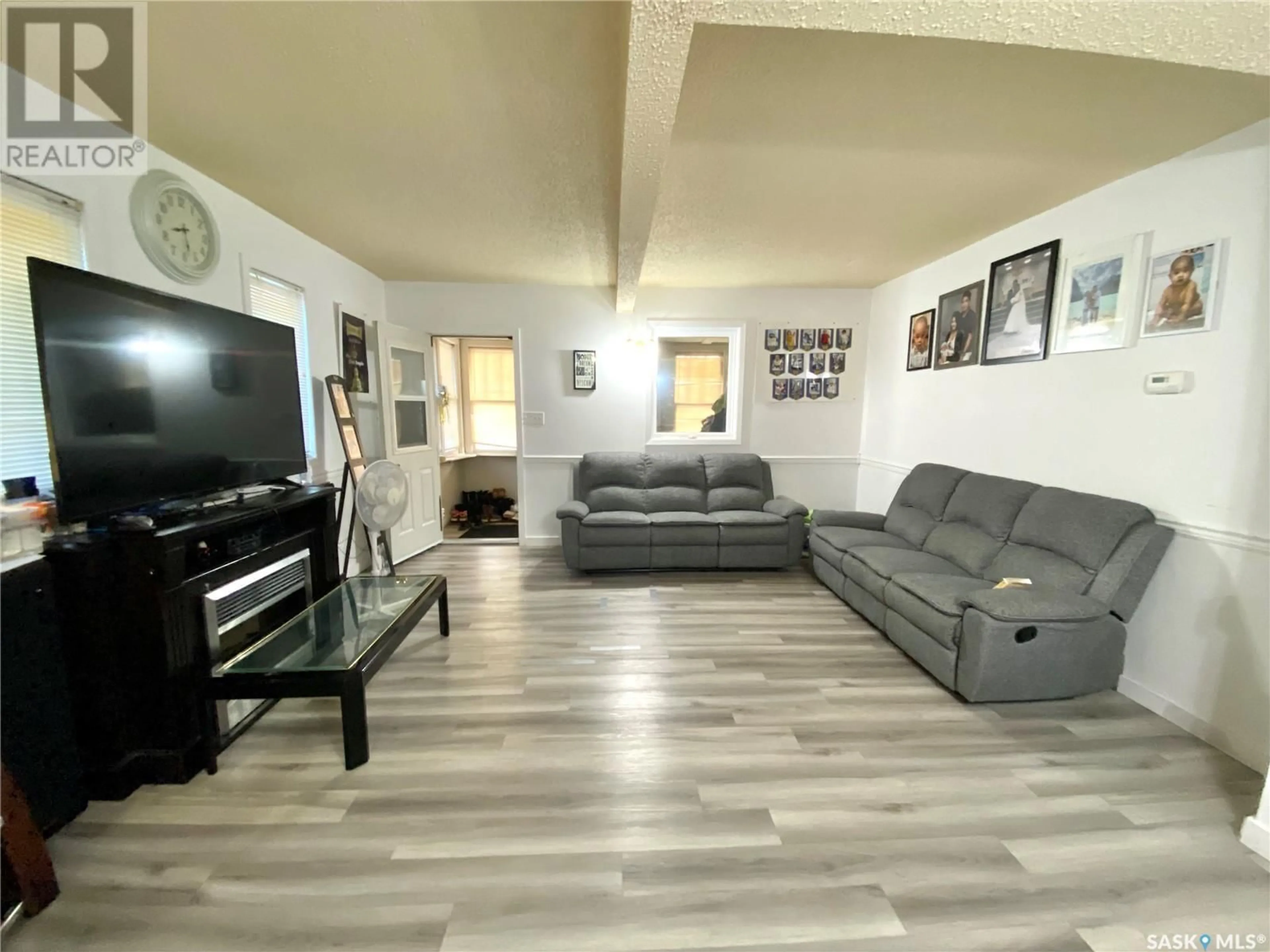 Living room with furniture, unknown for 119 3RD AVENUE, Swift Current Saskatchewan S9H2G4